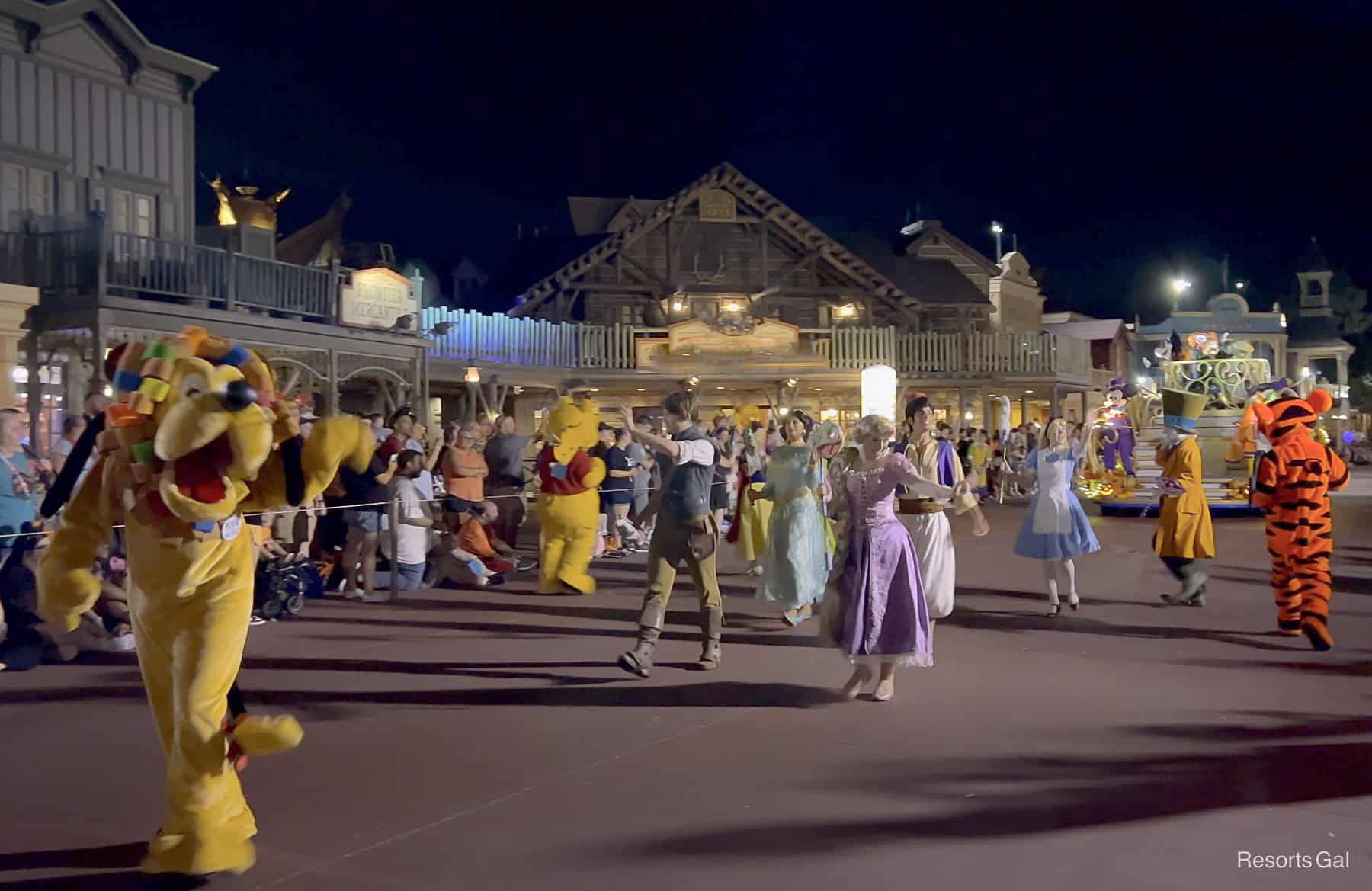 a walking troupe of classic characters in the Boo To You Parade 