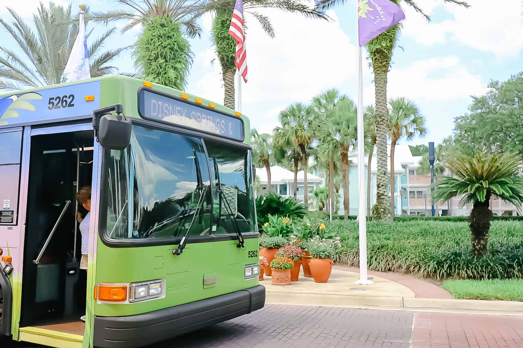 a bus to Disney Springs boarding guests at Disney's Old Key West 