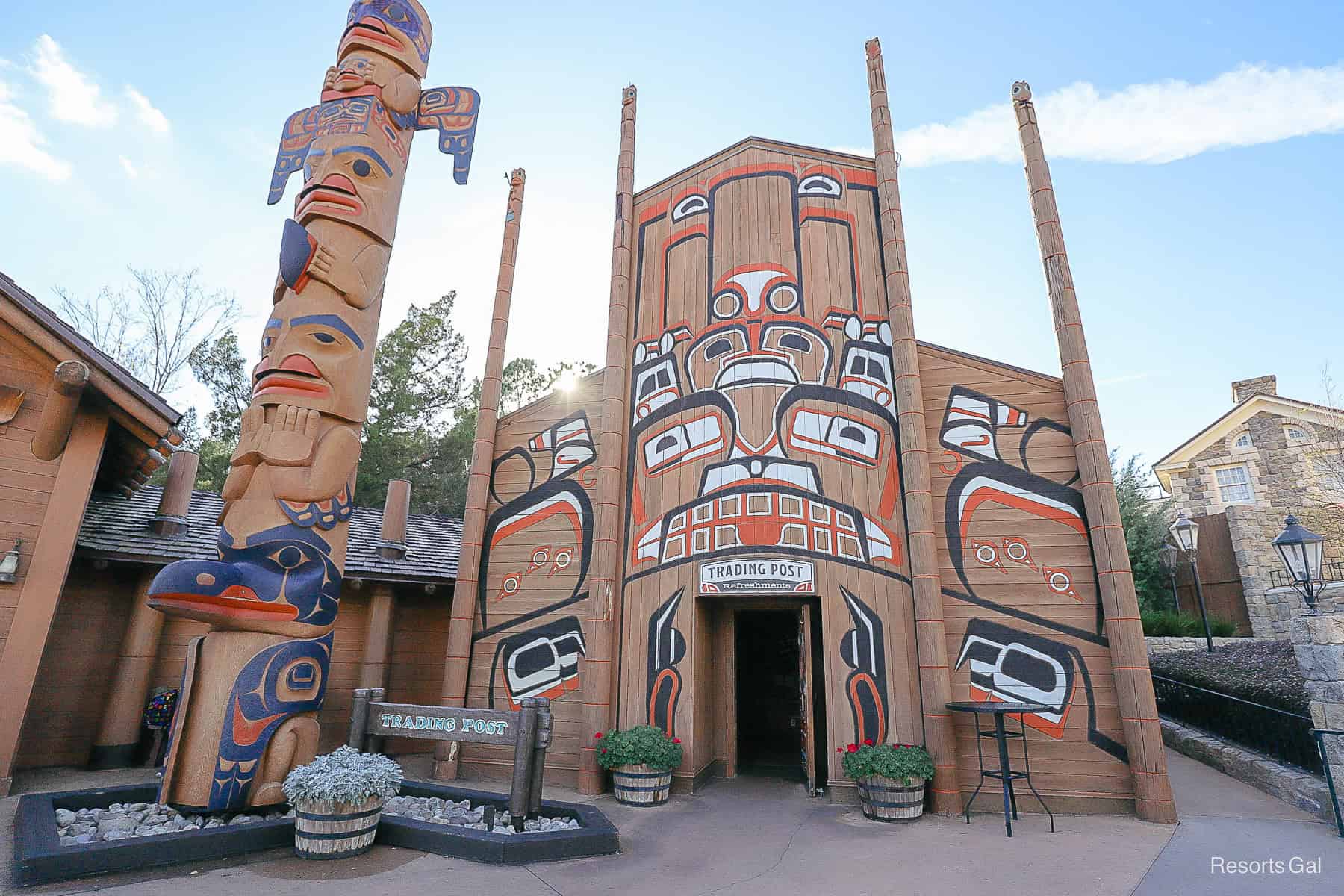 the Trading Post with a totem pole in front of it at Epcot's Canada Pavilion 