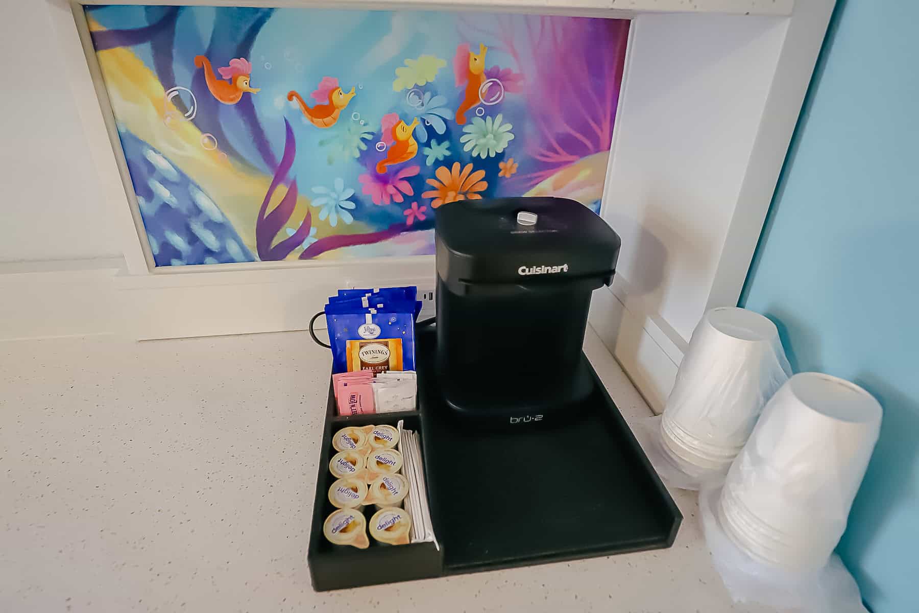 in-room coffee maker at Caribbean Beach with cups and creamers 