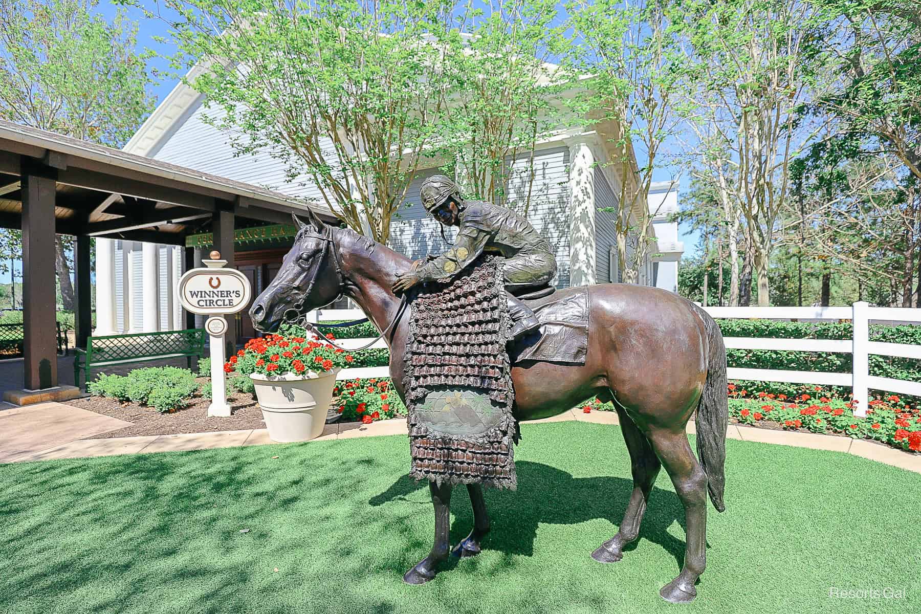 an iron statue of a horse and jockey at Disney's Saratoga Springs Resort 