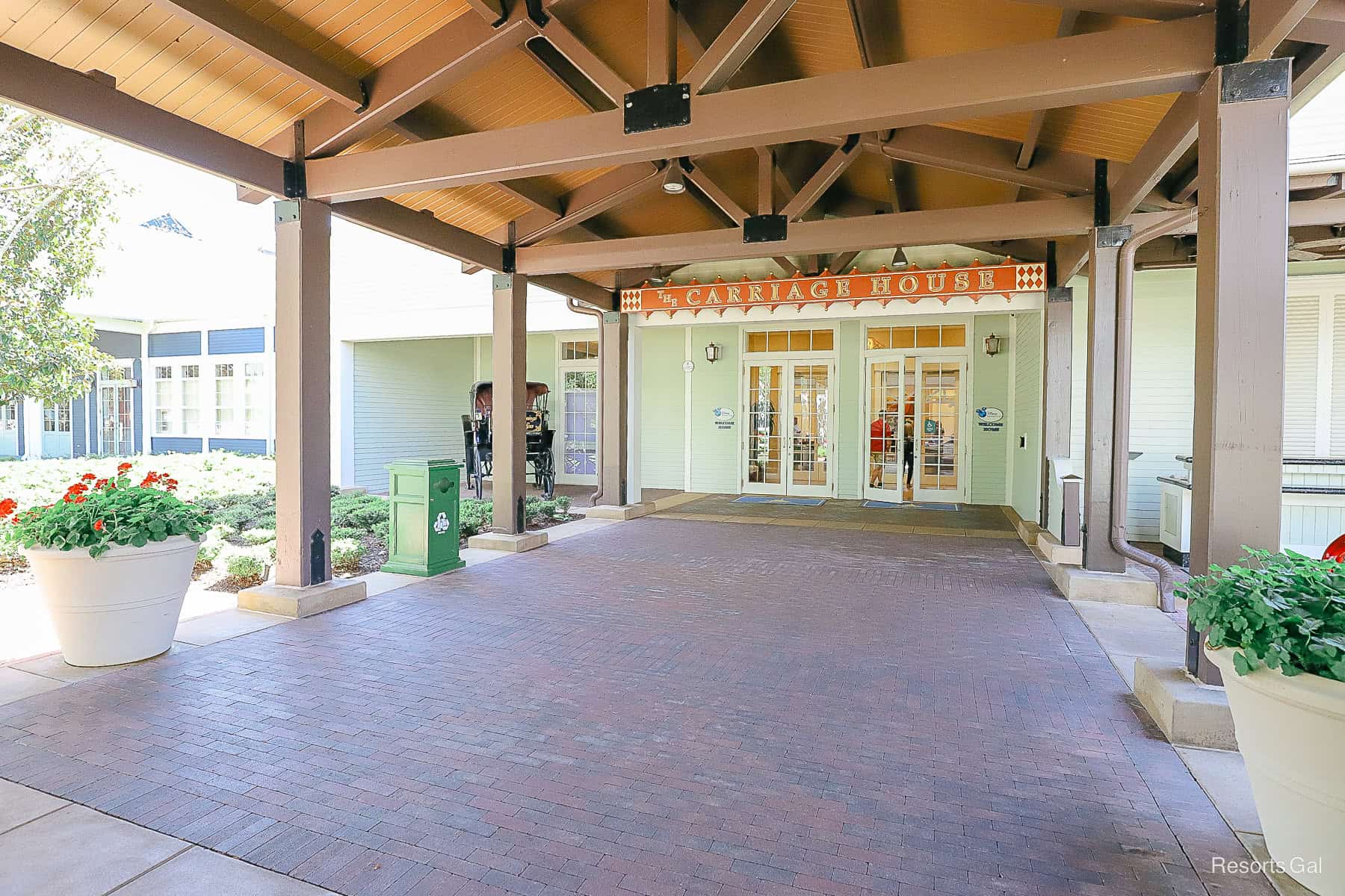 the Carriage House sign hangs over the lobby entrance 