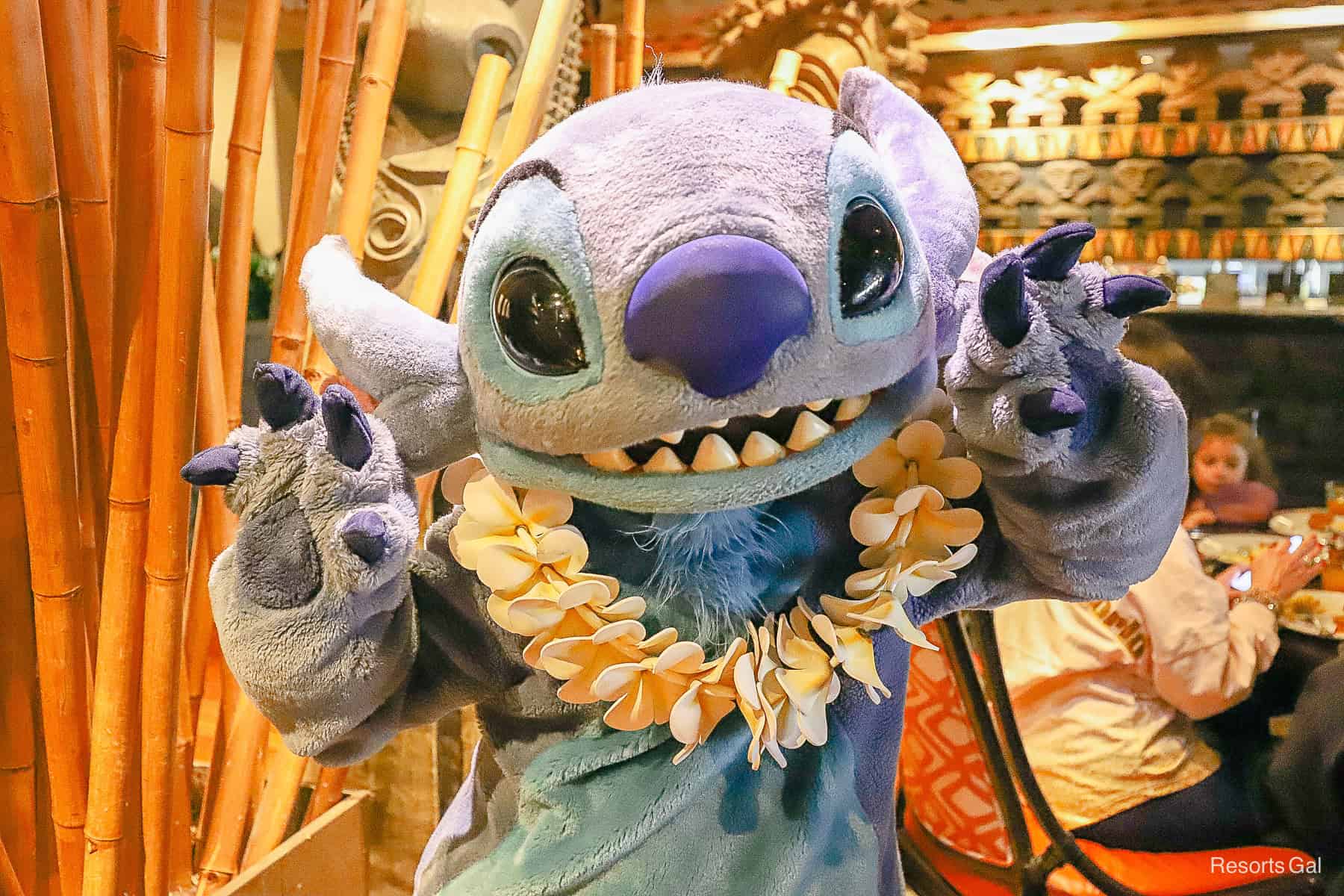 Stitch at a character meal at 'Ohana 