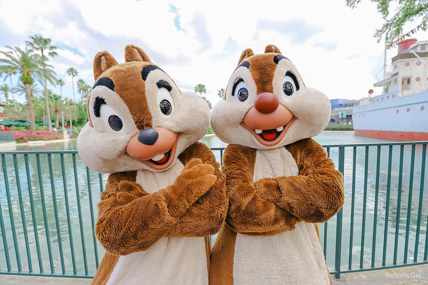 Chip and Dale pose with arms crossed in front of Echo Lake. 