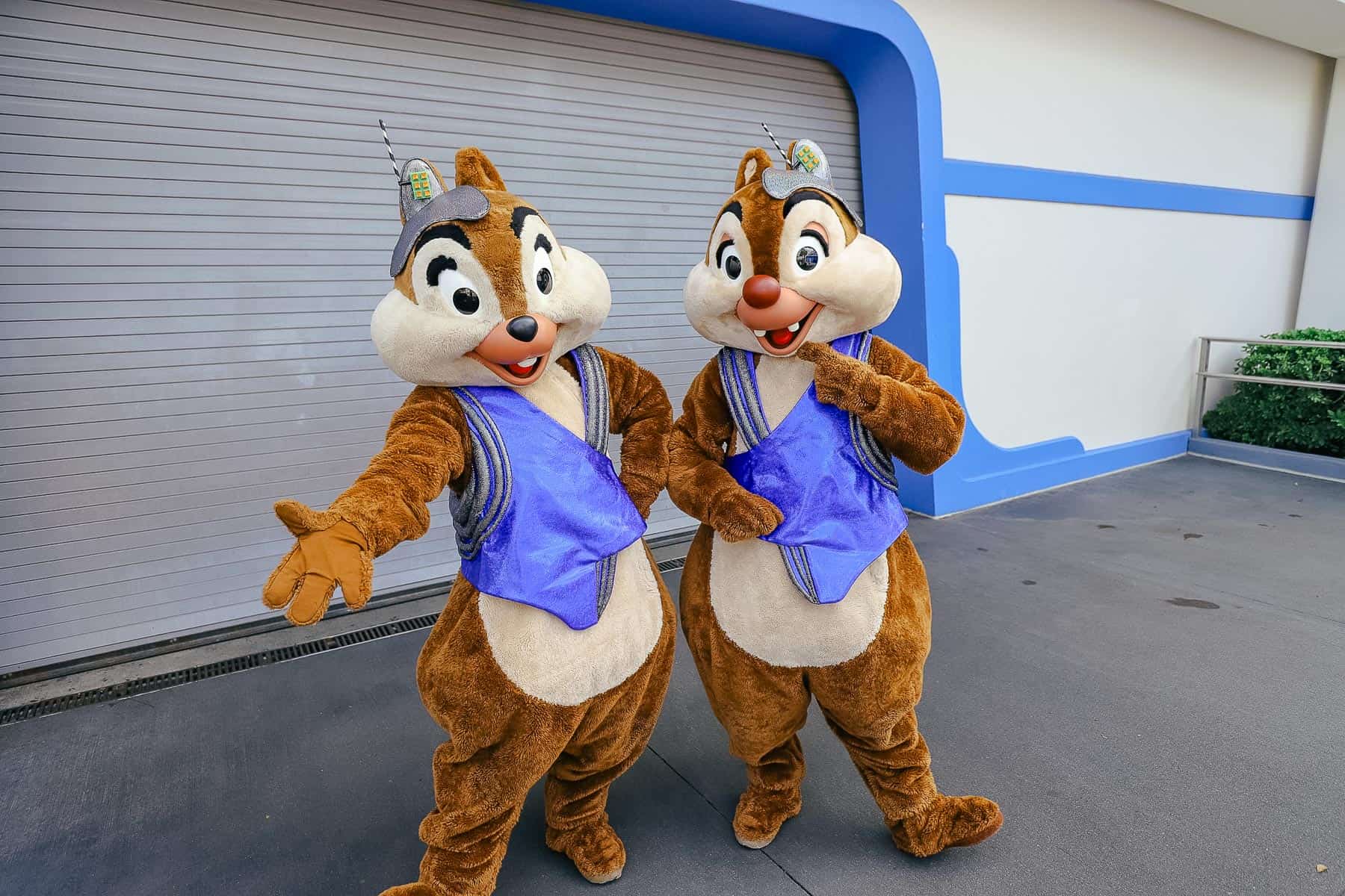 Chip and Dale pose in Tomorrowland at Magic Kingdom. 
