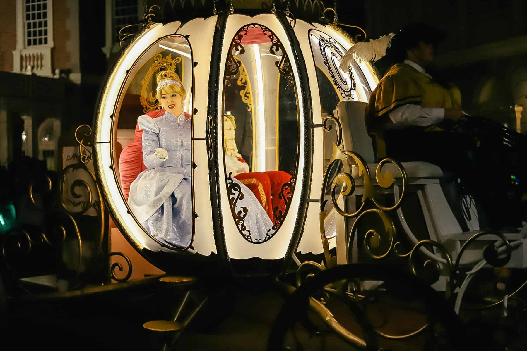 Cinderella rides in a coach during the Christmas Parade. 