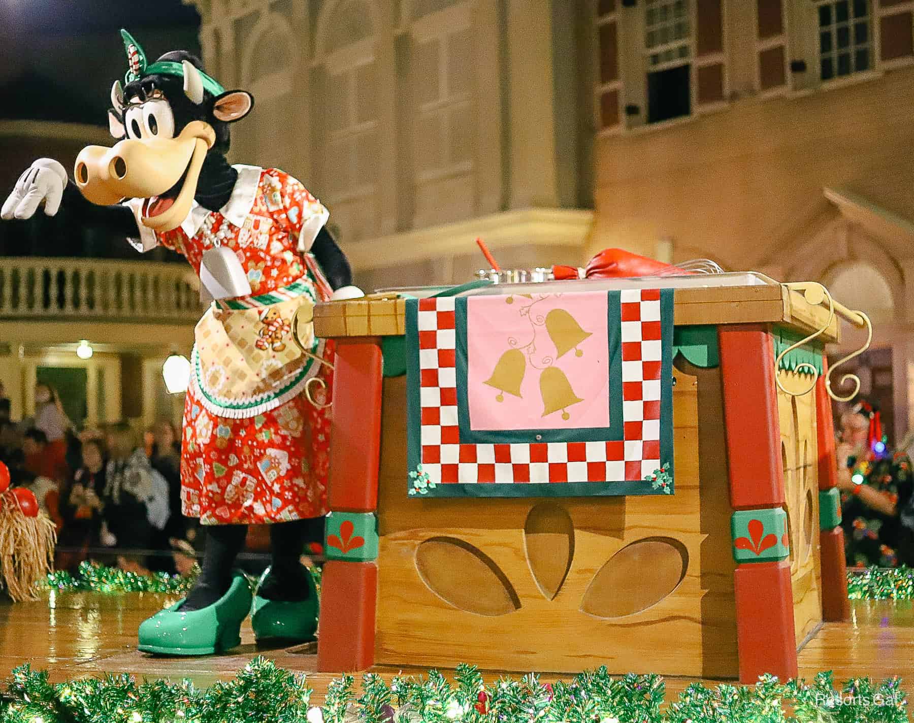 Clarabelle waves to the crowd from her float in the Christmas parade. 