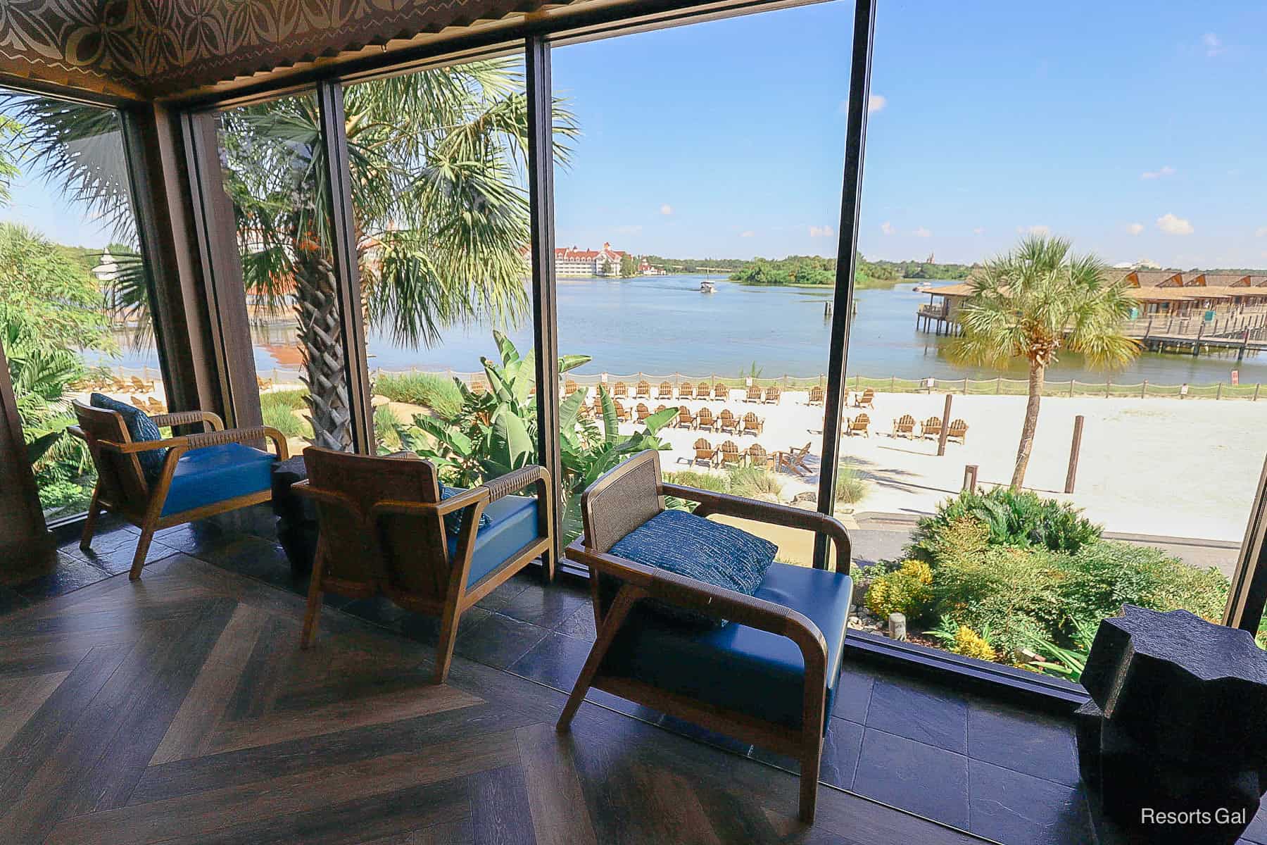 chairs facing the view of a club level lounge