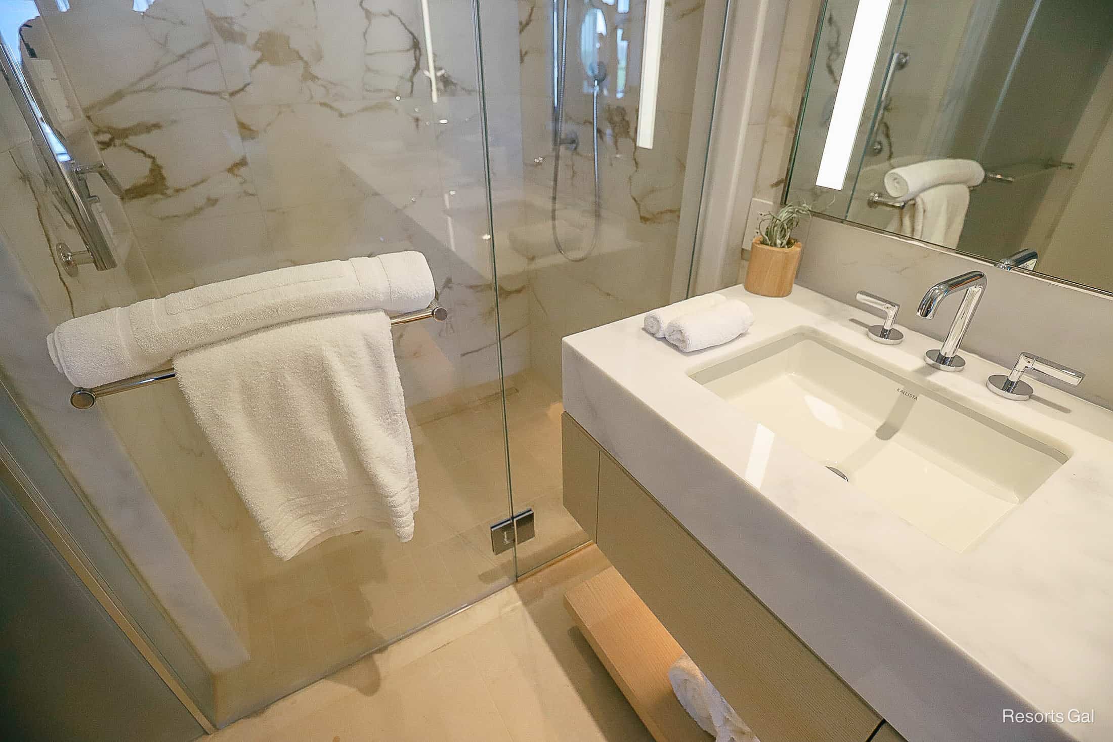 The guest bath with walk-in shower at the Conrad Hotel Orlando near Walt Disney World. 