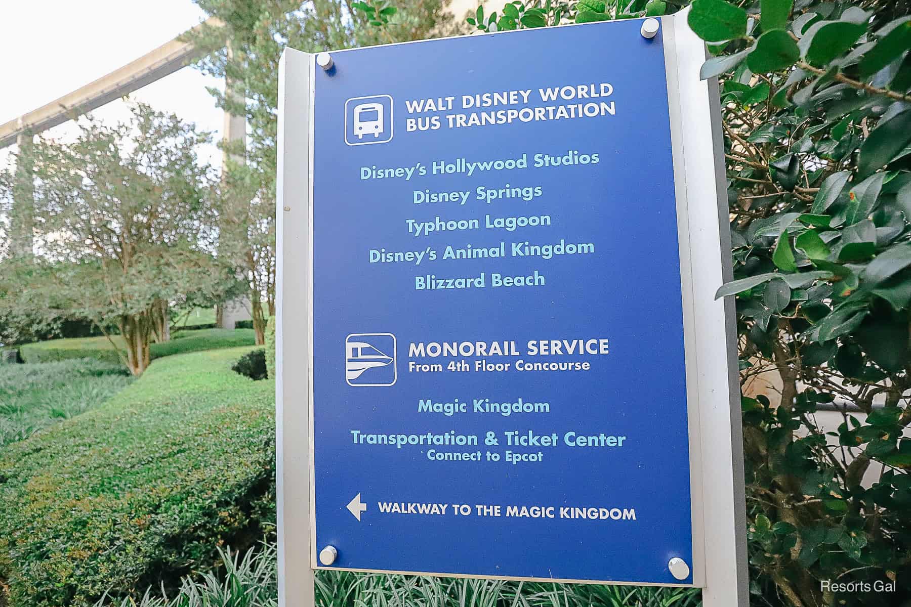a sign that shows the transportation options provided at Disney's Contemporary with a directional to the Magic Kingdom walkway 
