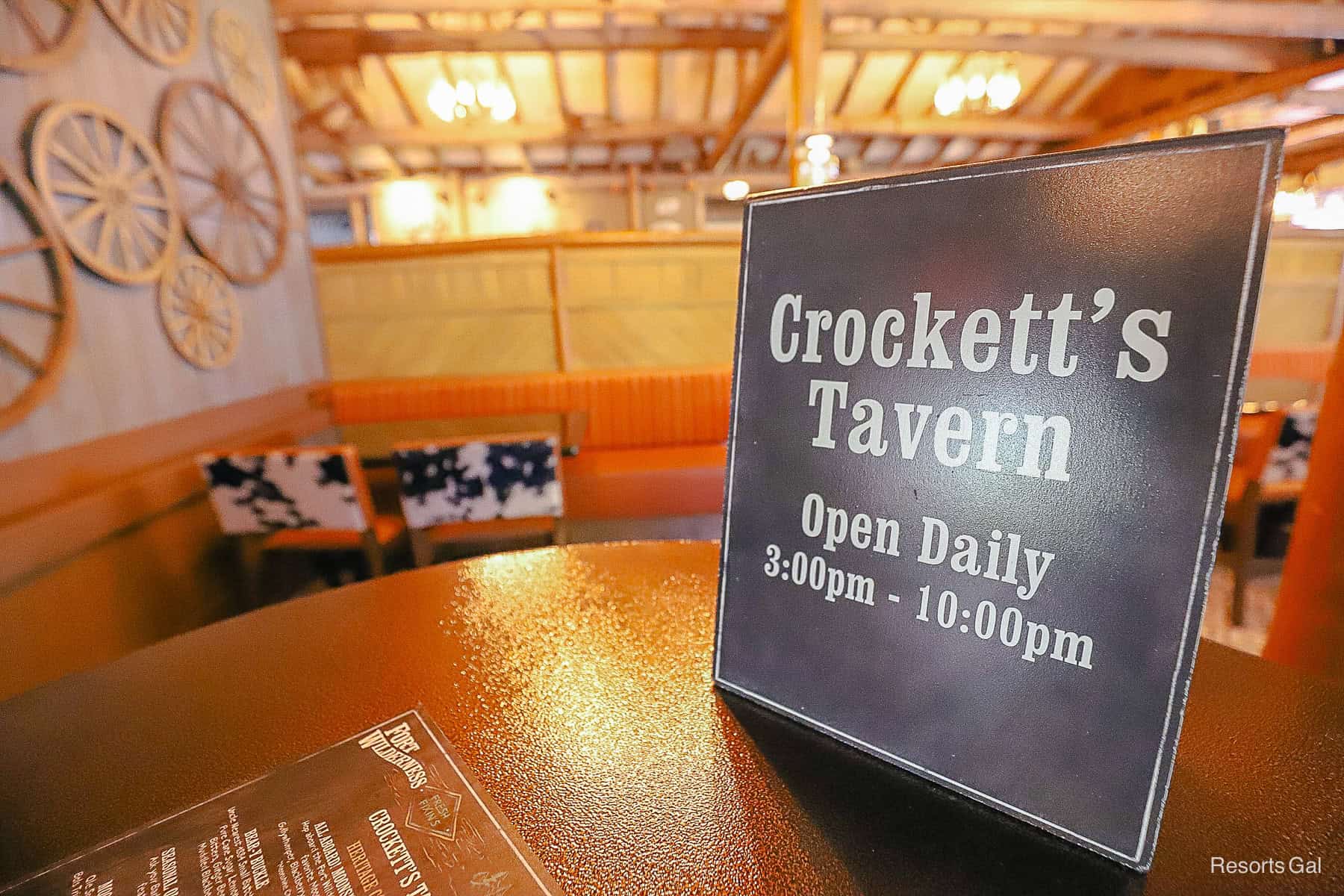 Crockett's Tavern hours of operation sign 