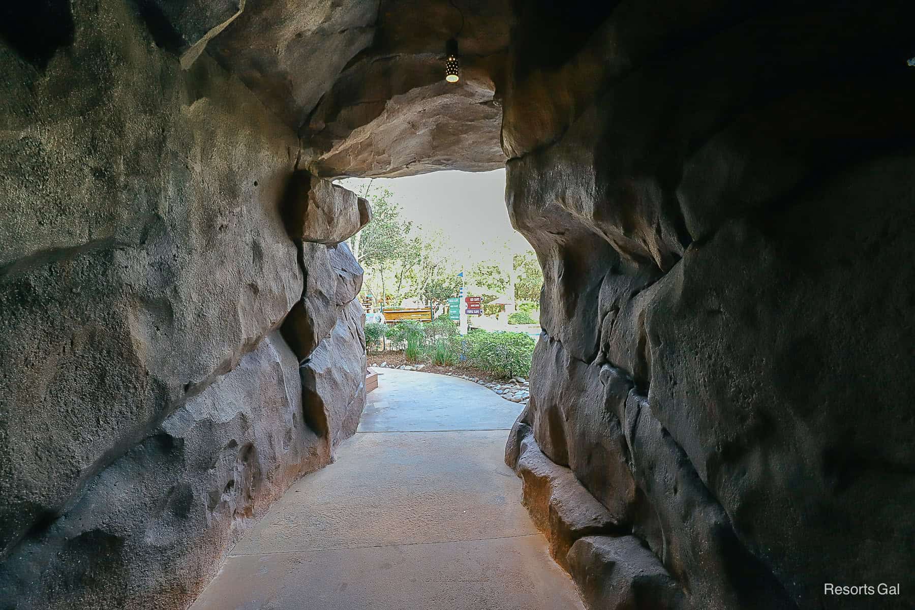 A walkway through the cave next to Cross Country Creek at Blizzard Beach. 