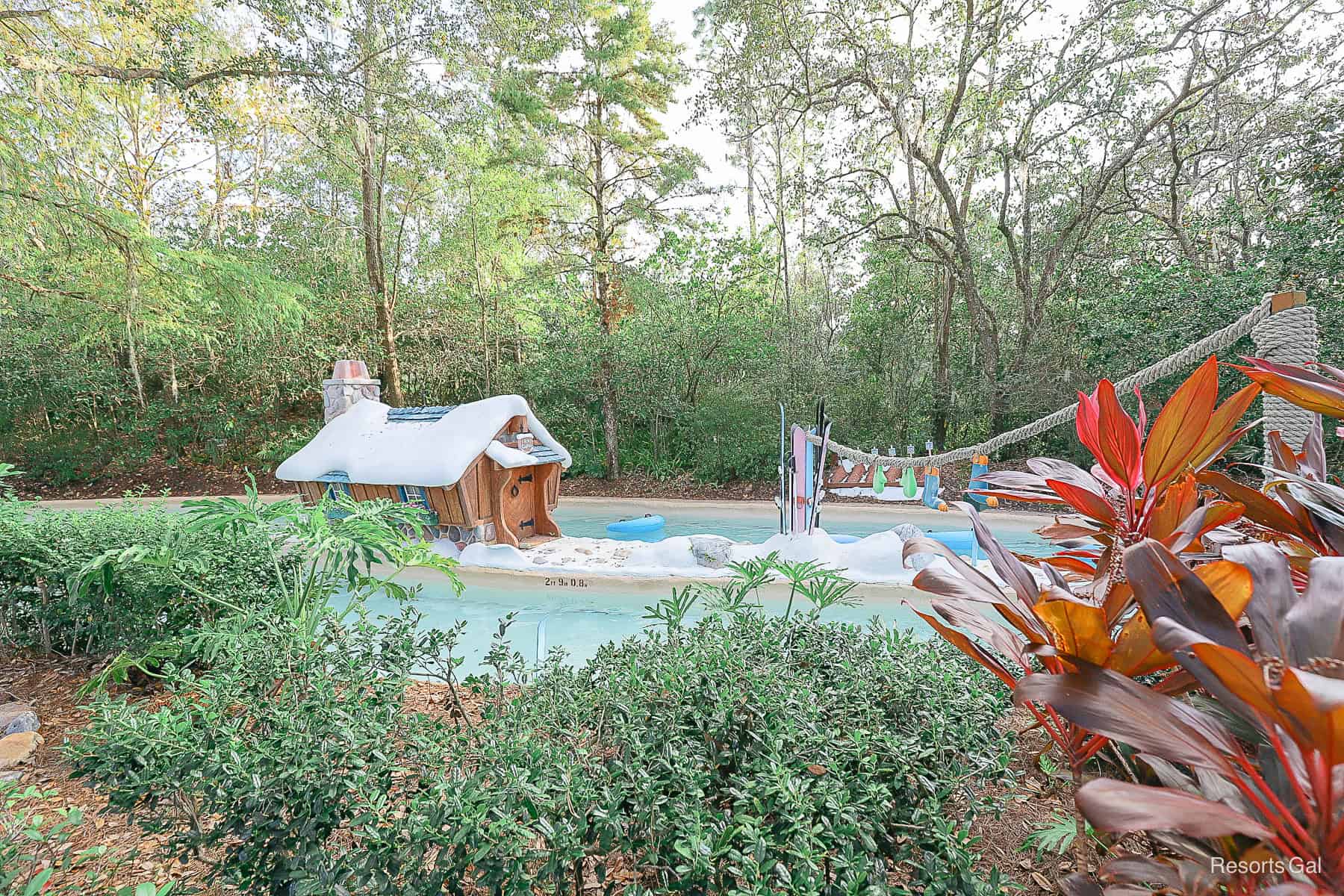 A glimpse of Ice Gator's shack in the lazy river with a clothesline hanging outside. 