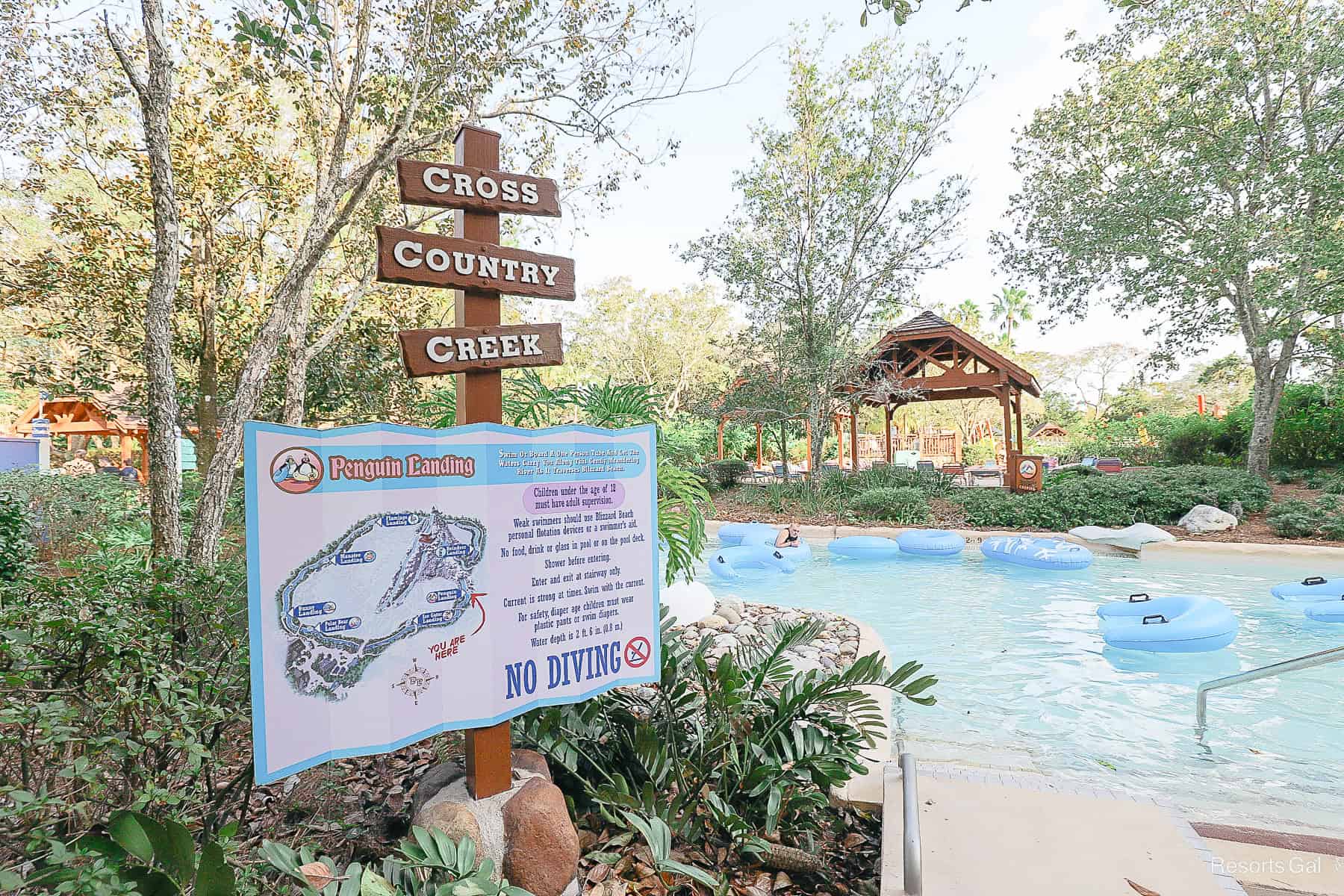 A sign that shows the entrance to Penguin Landing at Cross Country Creek.