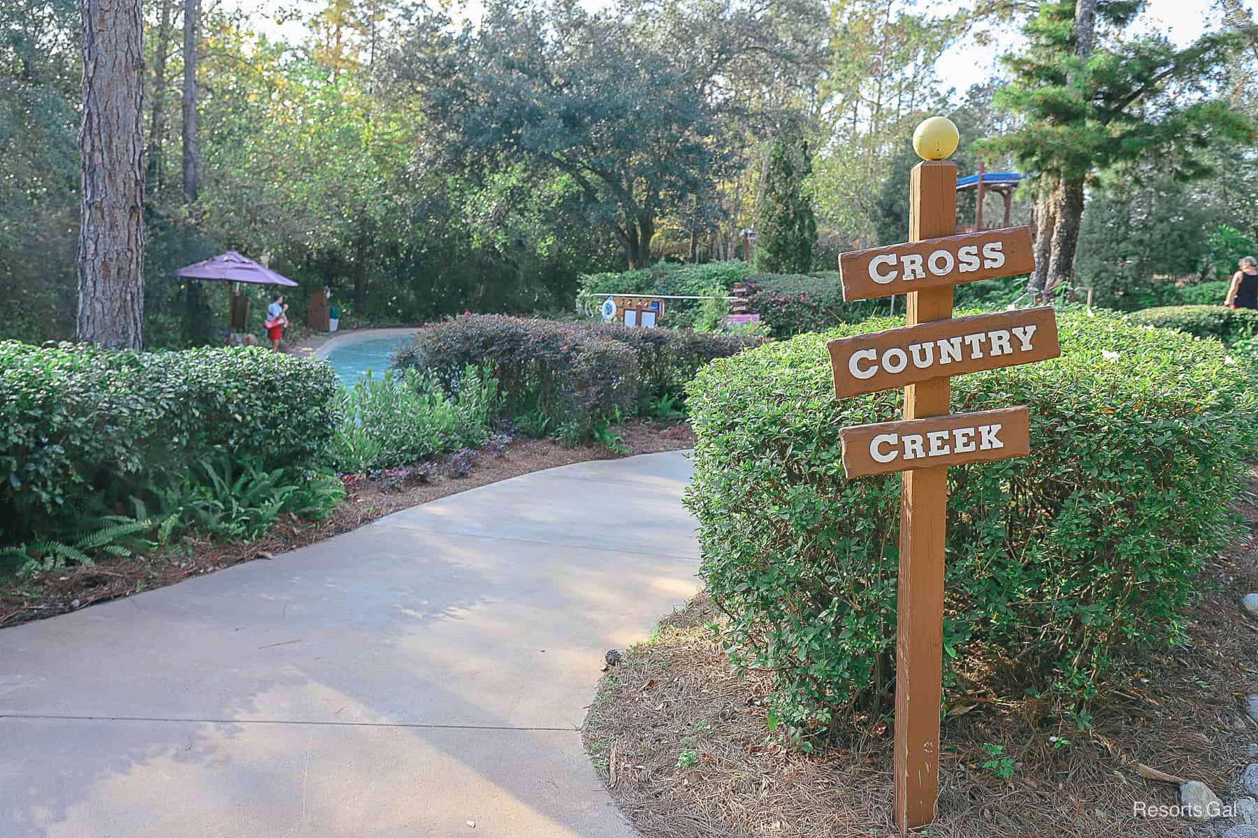 a sign that indicates the entrance of Cross Country Creek 