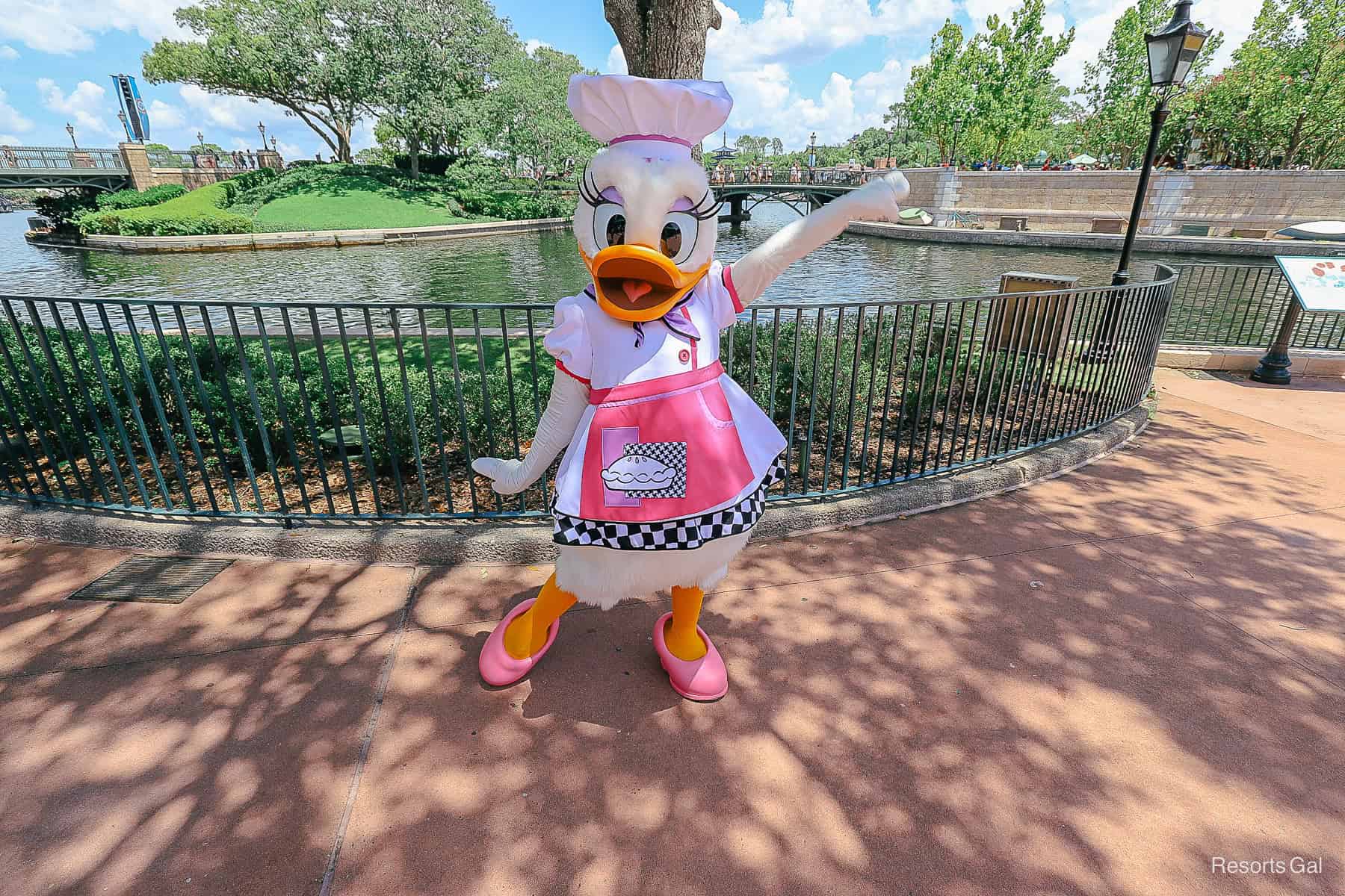 Daisy Duck wearing a chef outfit during Epcot's International Food and Wine Festival