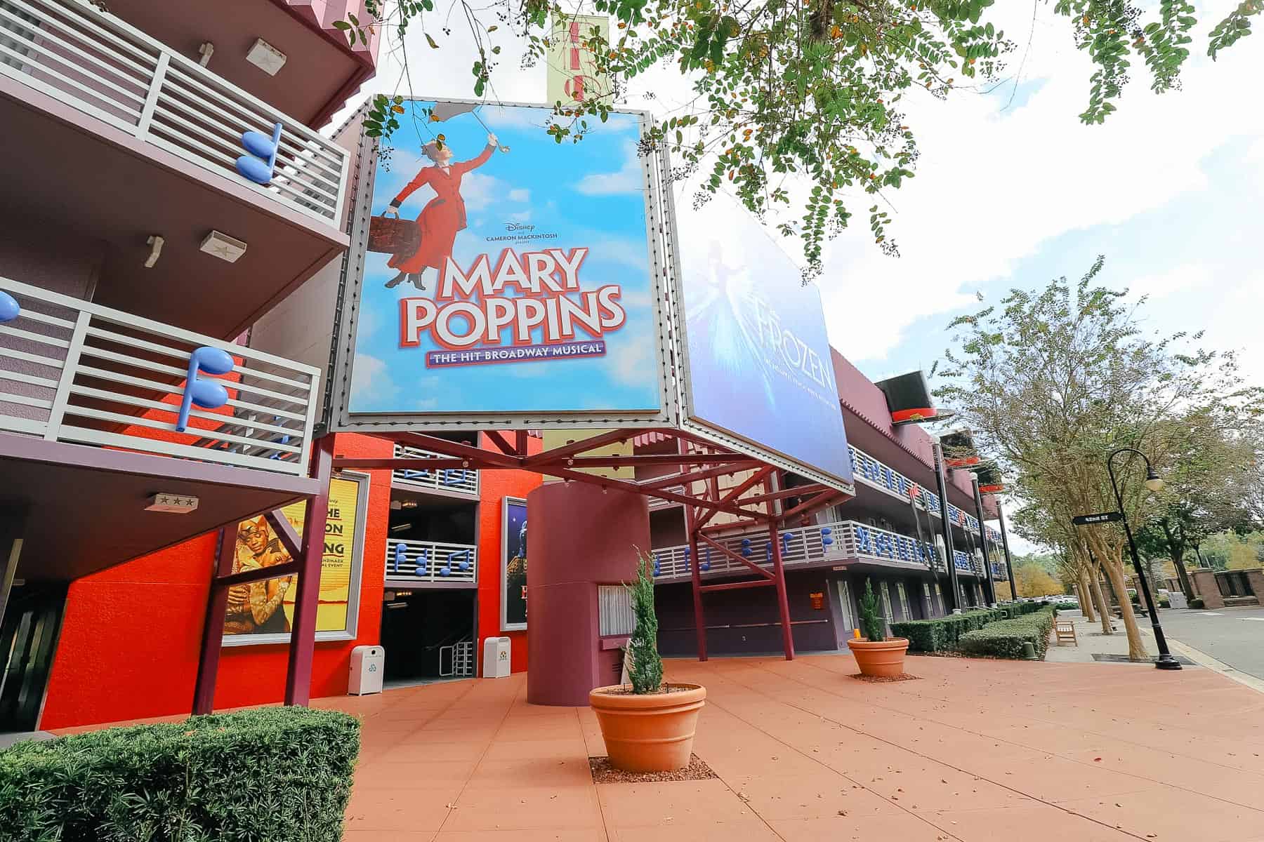 a Mary Poppins billboard in the Broadway section of Disney's All-Star Music 