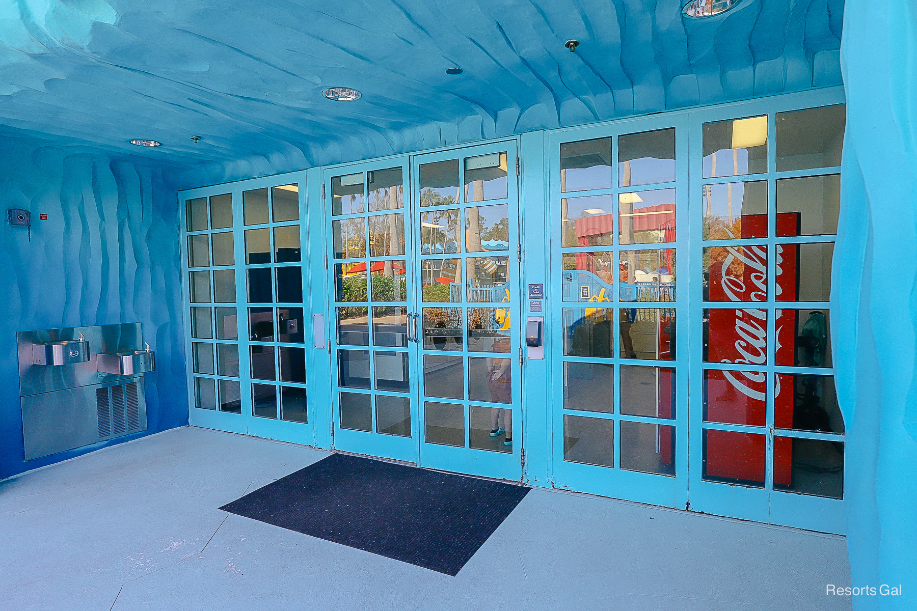 the doors to the laundry room by the Fantasia Pool at All-Star Movies Resort 