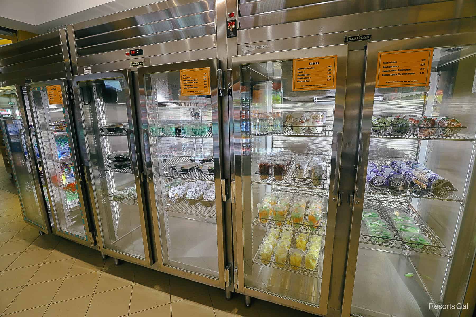 refrigerated cases with grab and go items at Disney's All-Star Music food court 