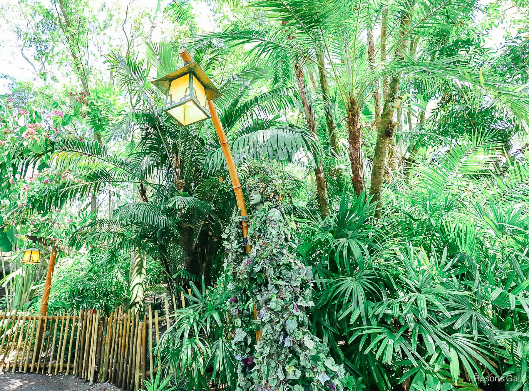 Divine in her greenery wrapped around a light pole at Disney's Animal Kingdom. 