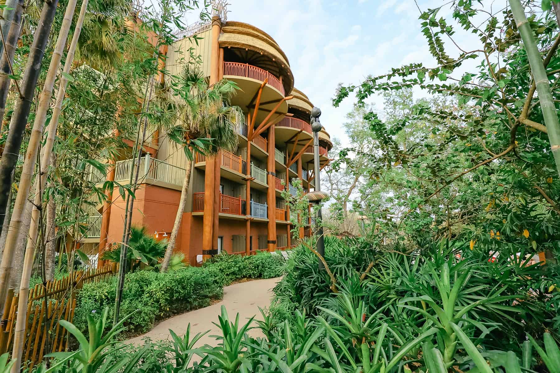 the exterior of Disney's Animal Kingdom Lodge with luscious landscape 