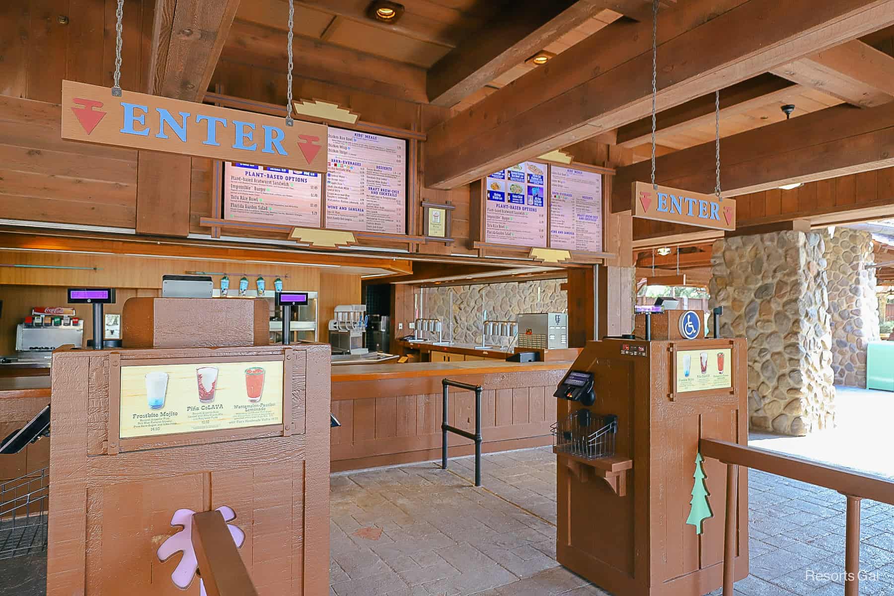 cash registers stands and menu boards at Blizzard Beach's quick service dining location 