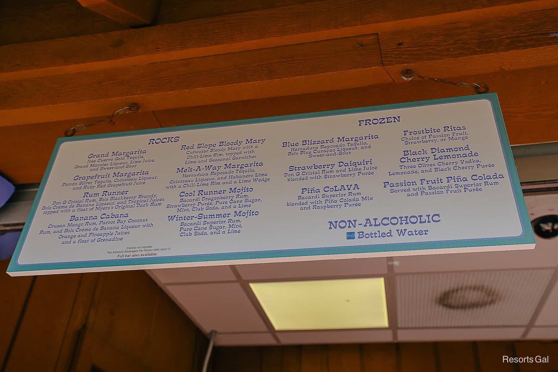 a menu board that lists the specialty cocktails at Blzzard Beach 