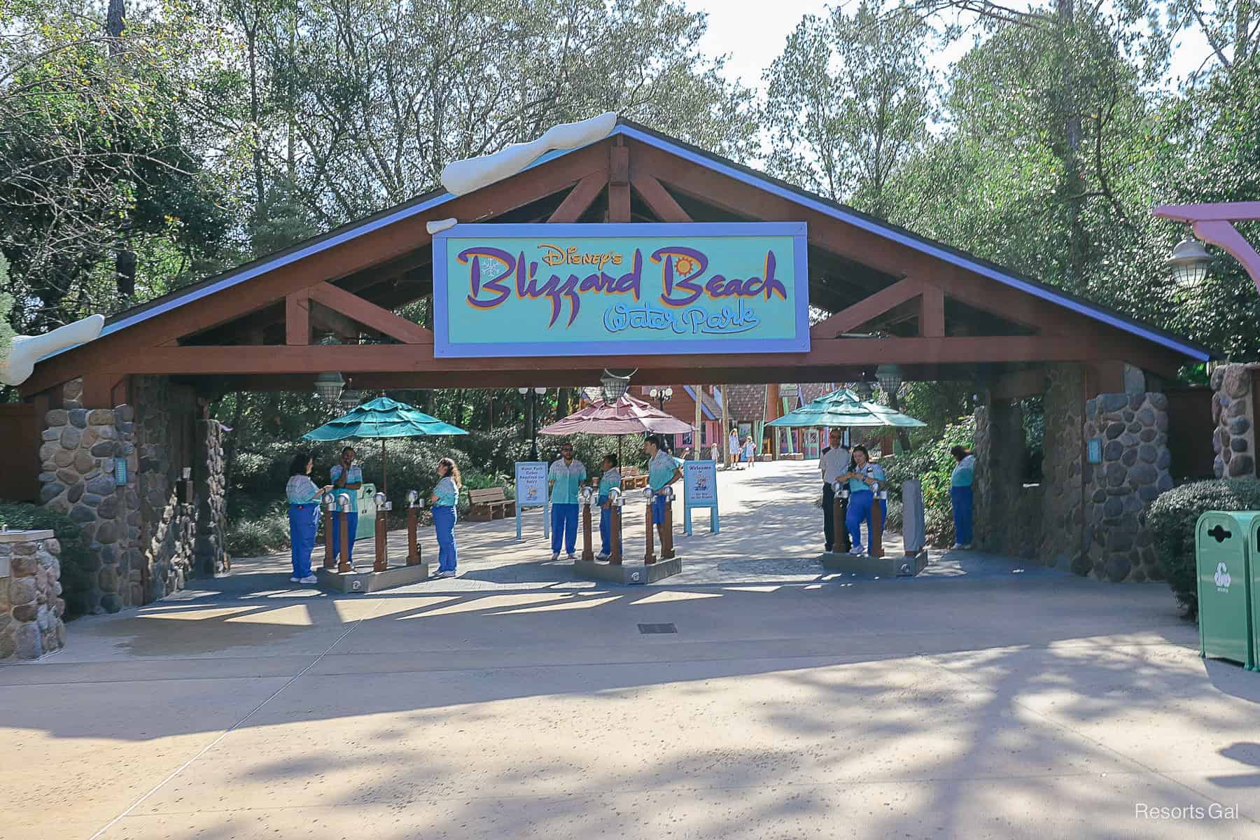 the entrance of Disney's Blizzard Beach with cast members 