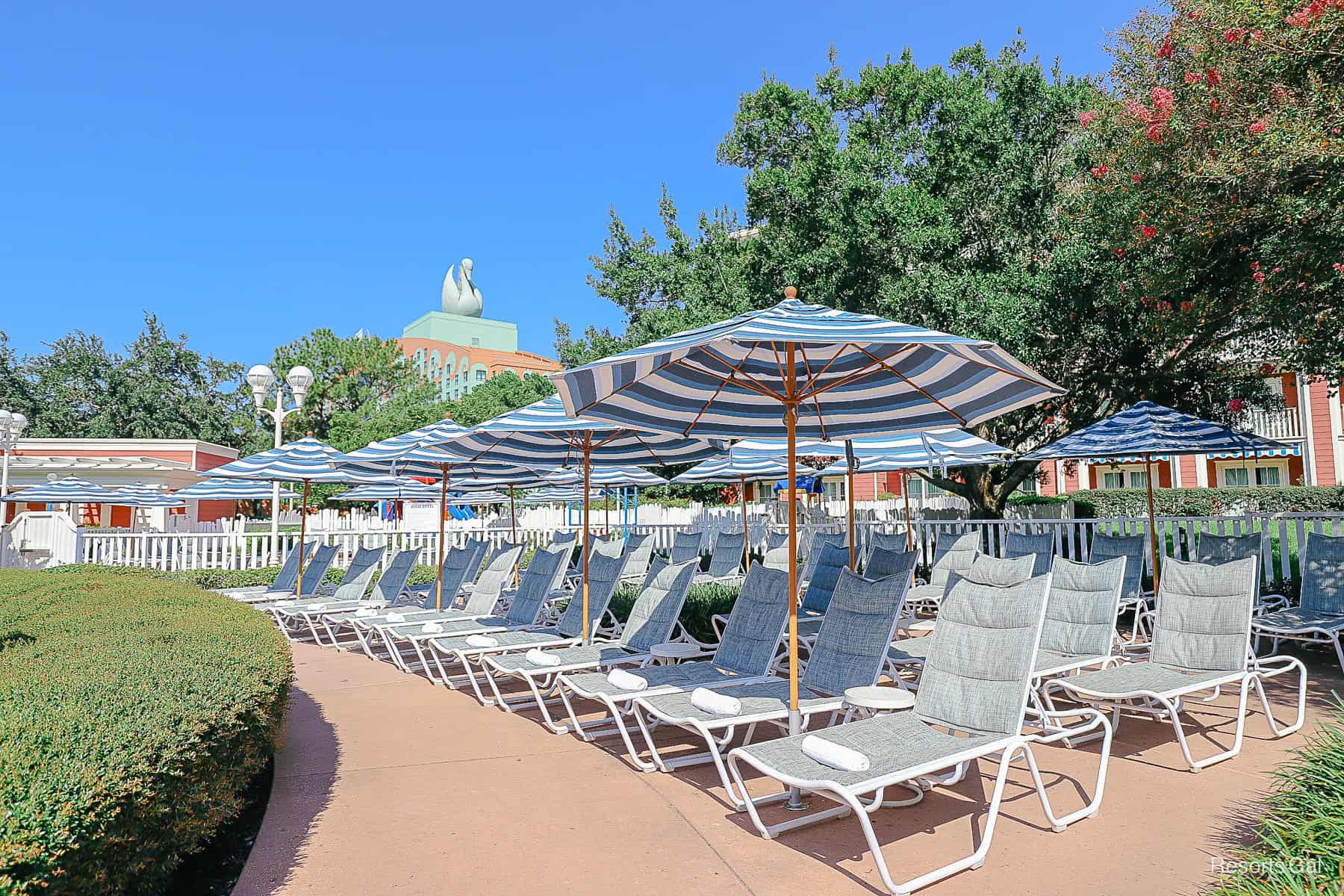 an empty pool deck at Disney's Boardwalk before the pool area opens 