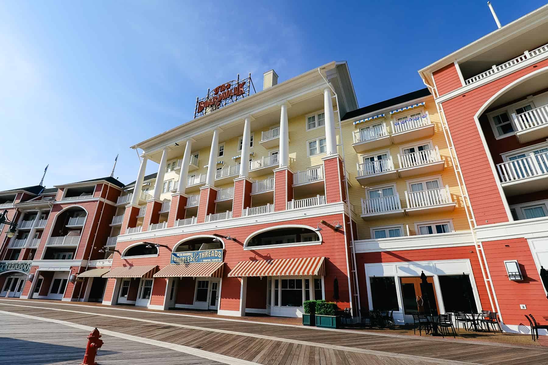 Disney's Boardwalk with red and yellow siding and wooden planks 