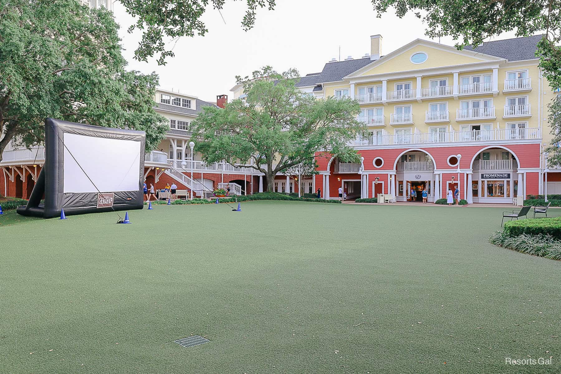 the green lawn at Disney's Boardwalk with a blow up projector movie screen 