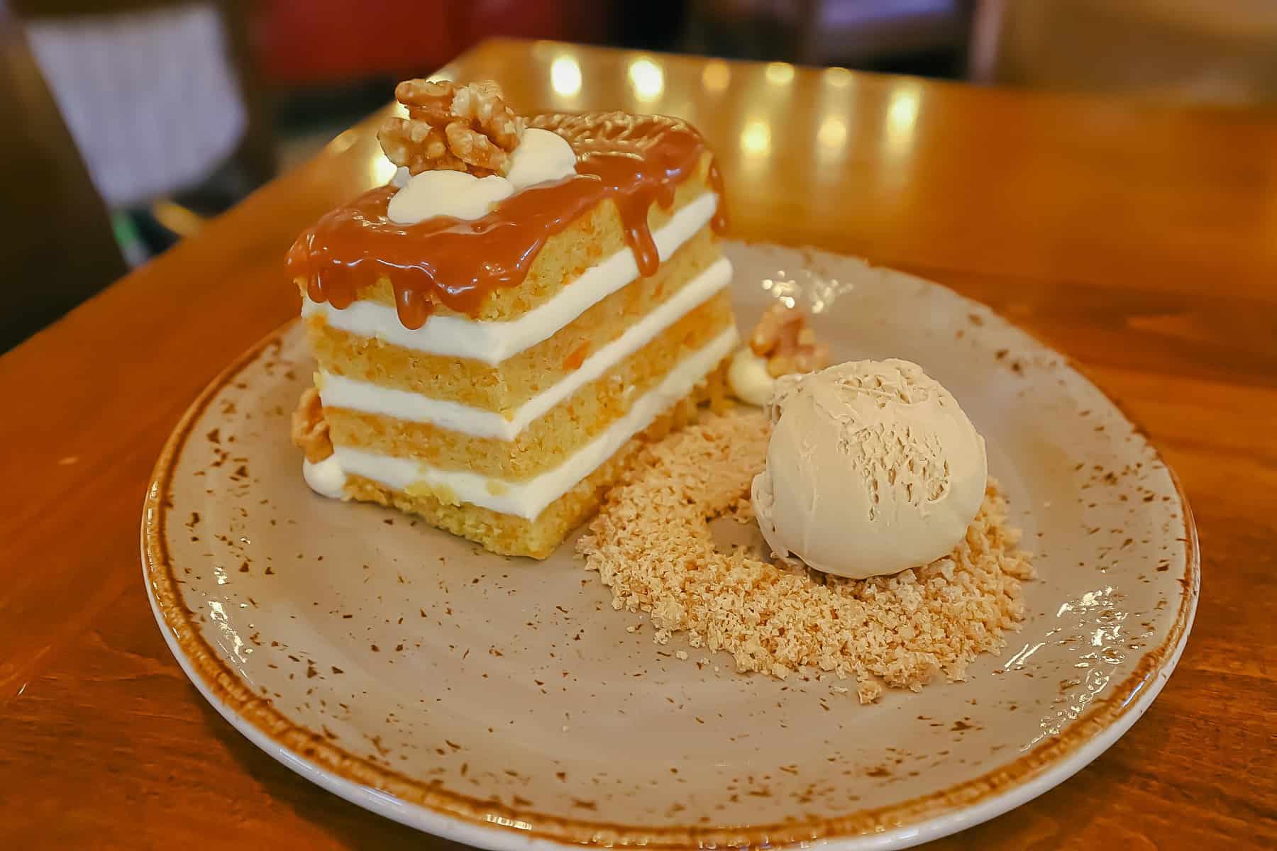 Guests on the Disney Dining Plan get dessert each evening like this carrot cake with caramel icing. 