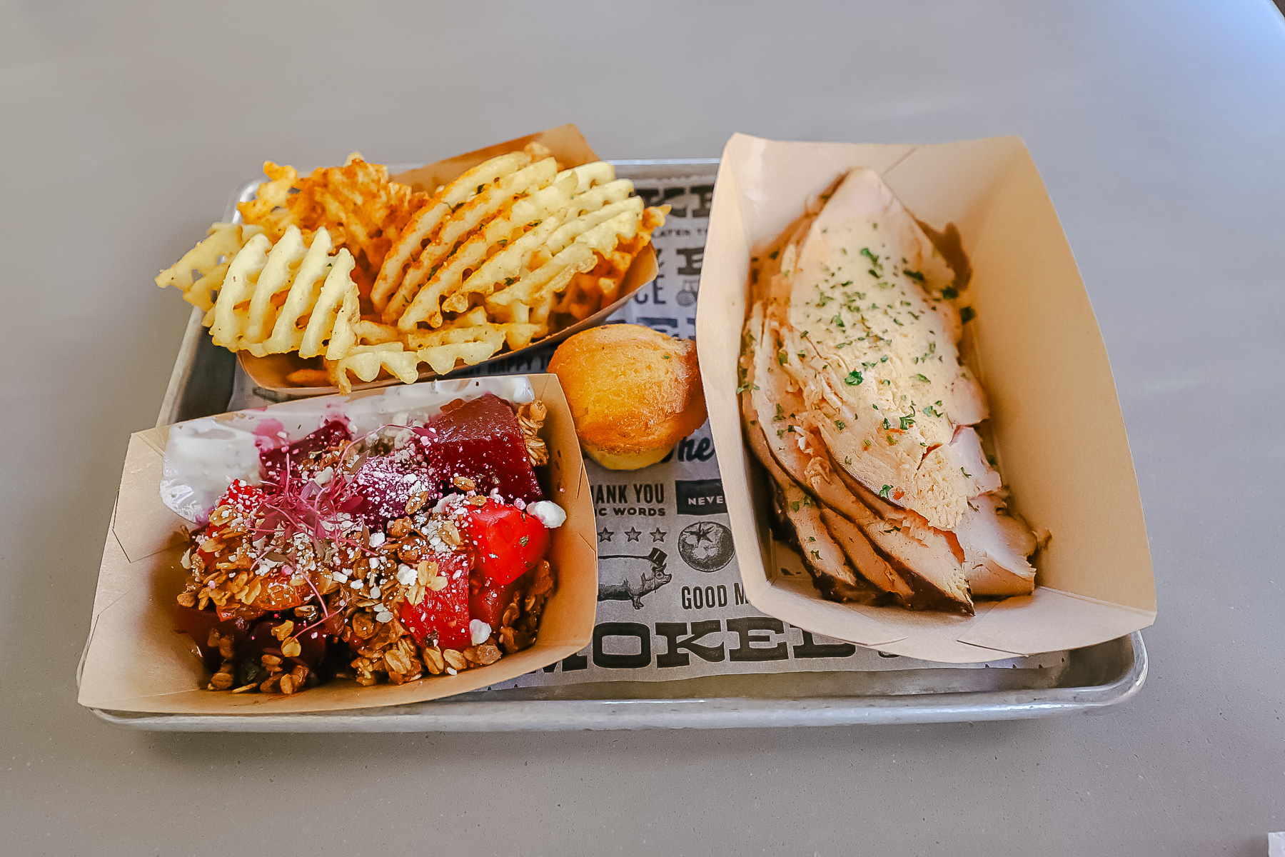 a meal on the Disney Disney Dining Plan with a meat and two sides