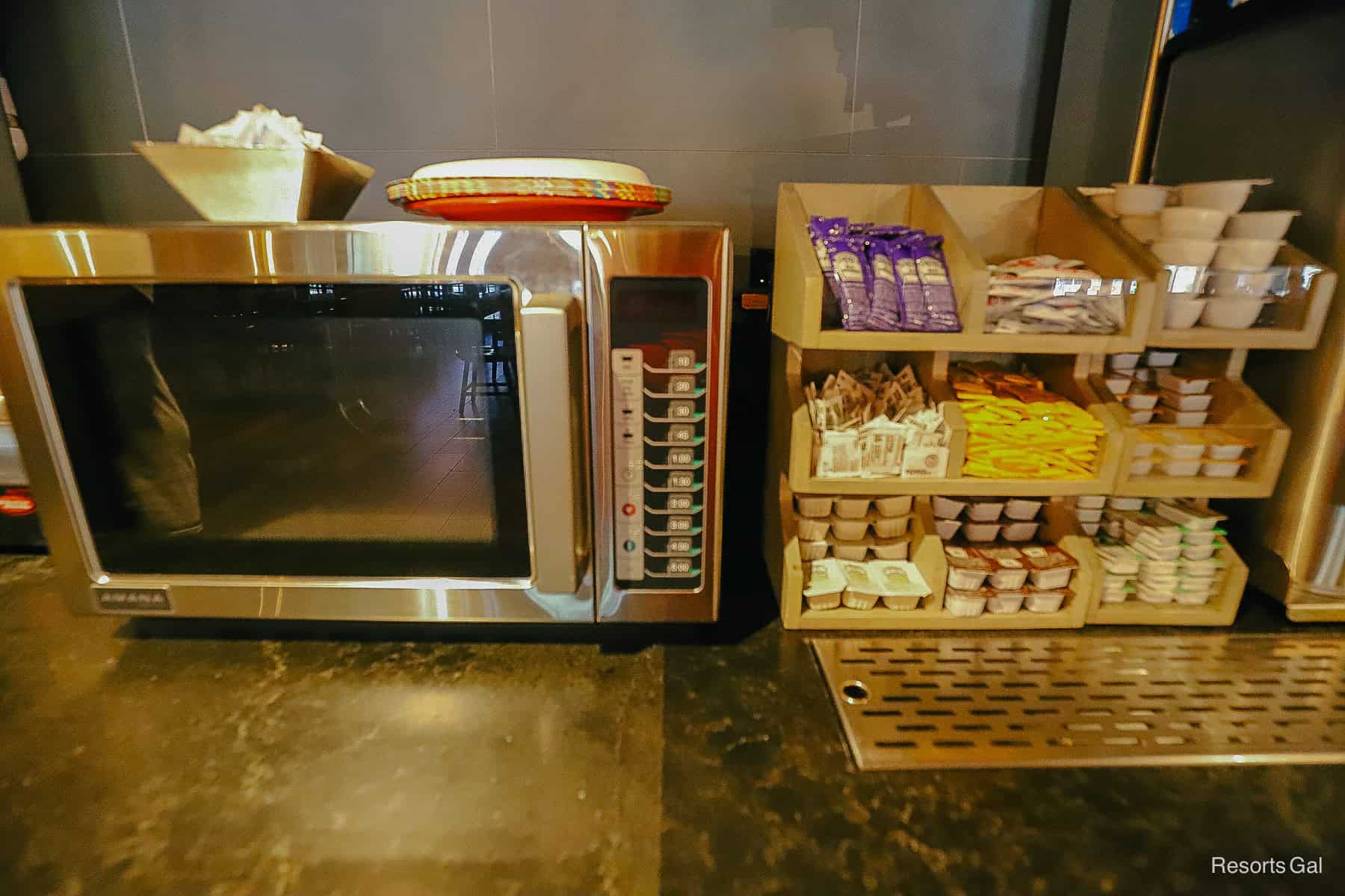 a microwave and condiments area in Trail's End Restaurant 