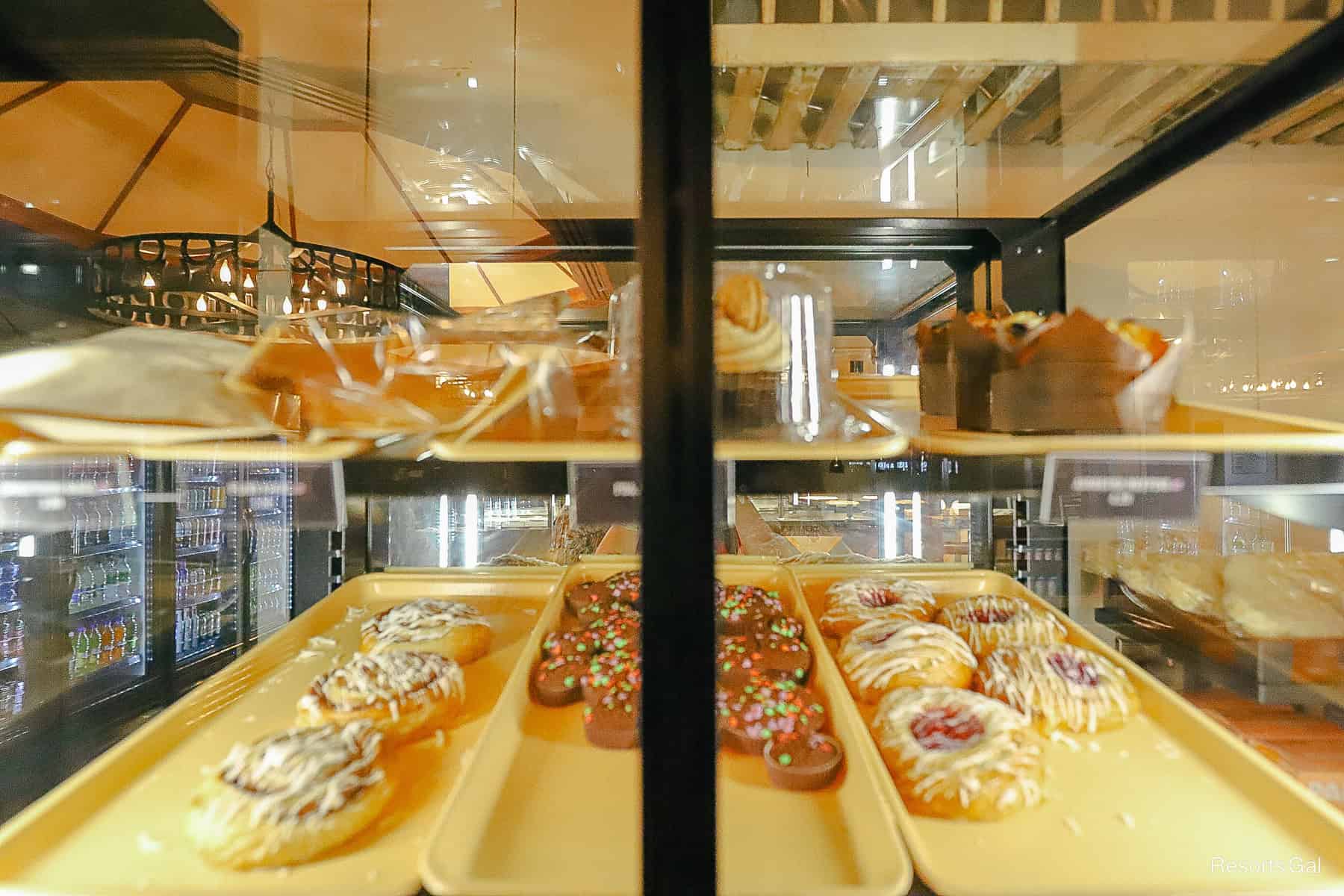 a pastry case with desserts at Trail's End 