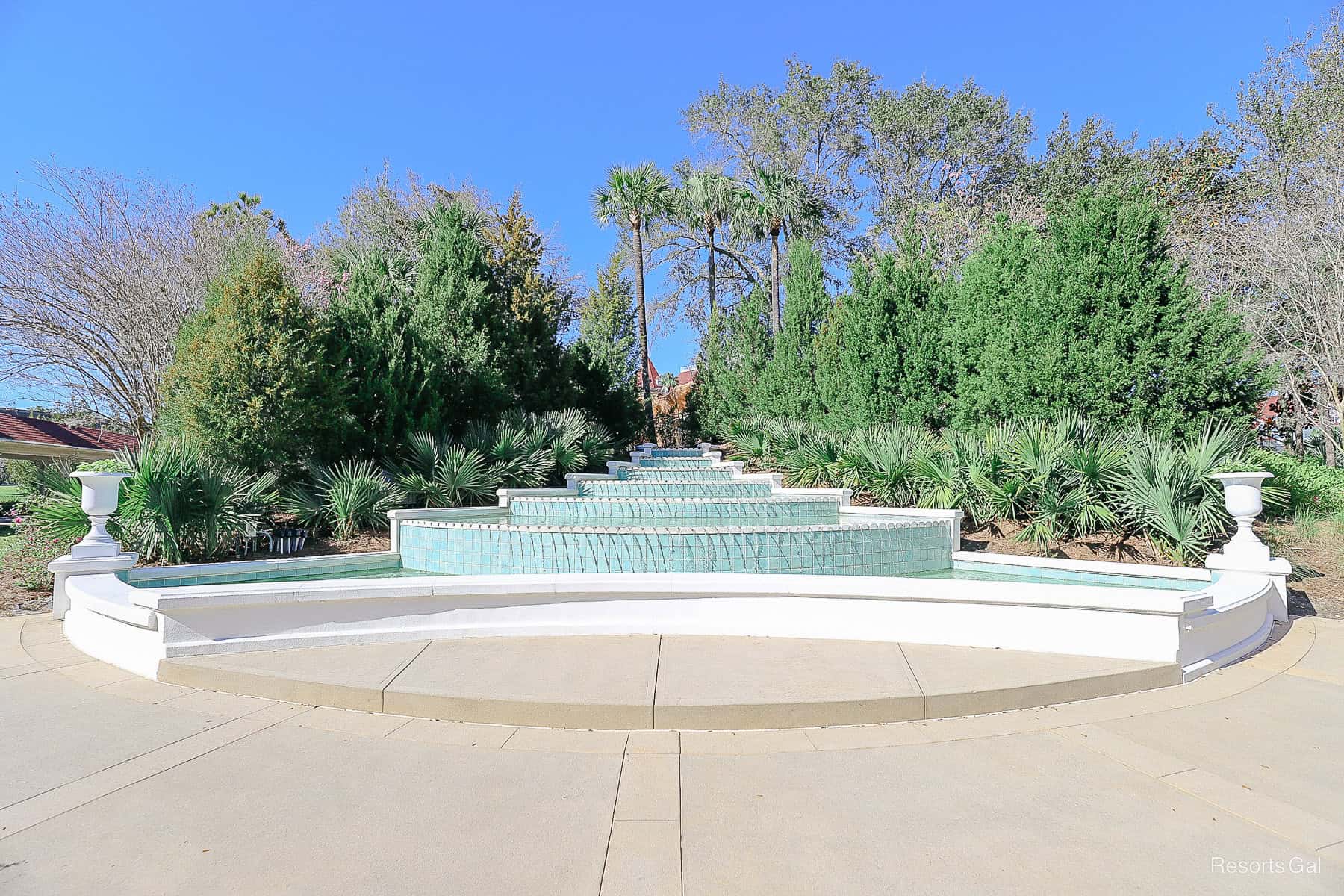 the staggered green fountain that sits in front of the Villas 