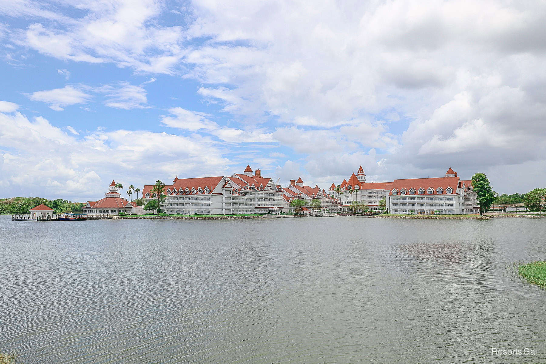 a view of the Grand Floridian as seen from a boat on the lake 