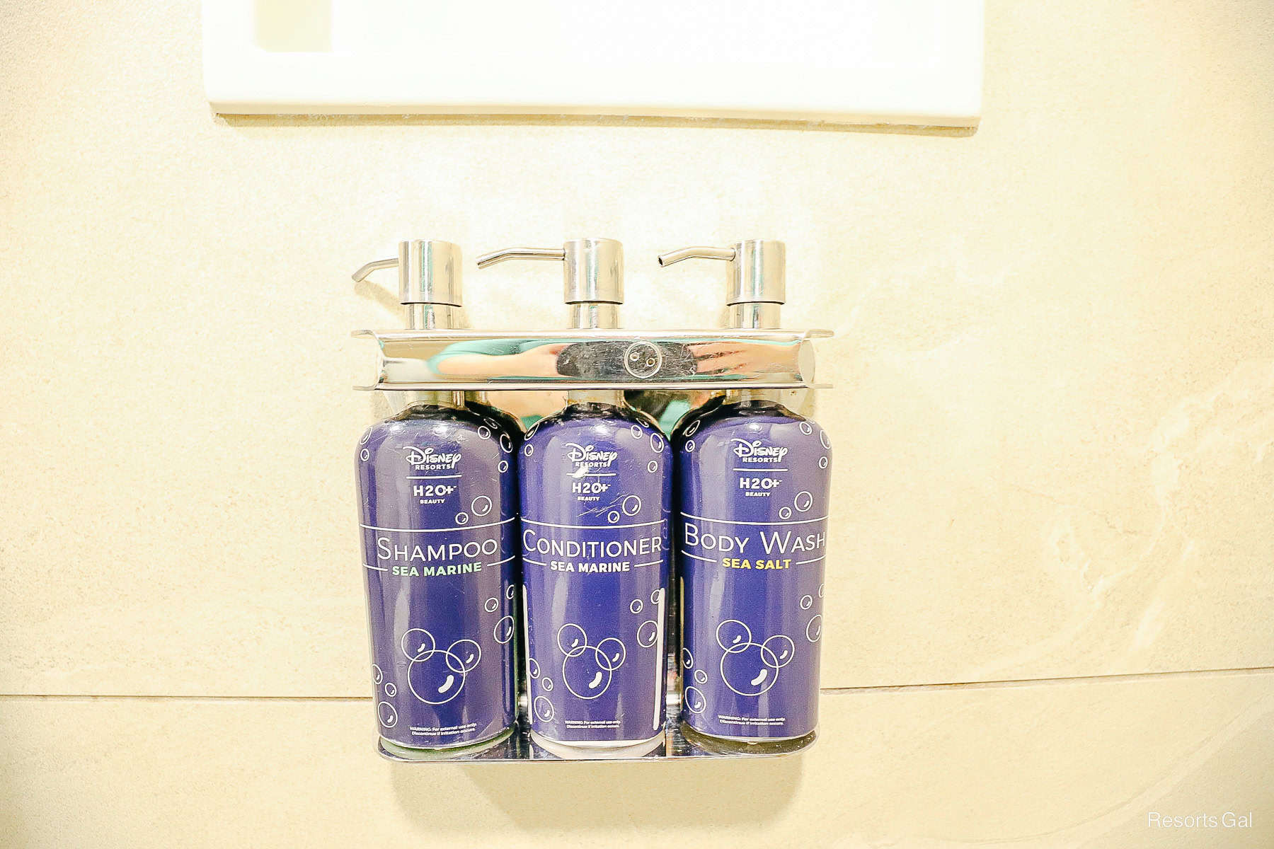 shampoo, conditioner, and body wash in a Disney hotel room 