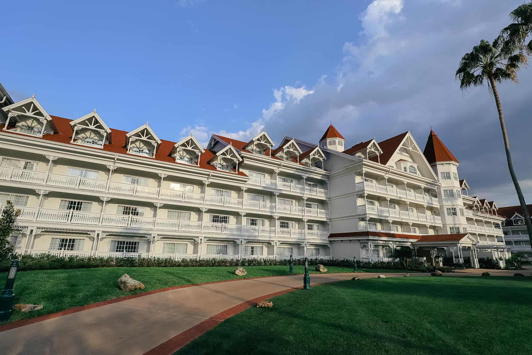 Disney's Grand Floridian hotel with white siding and red roof 