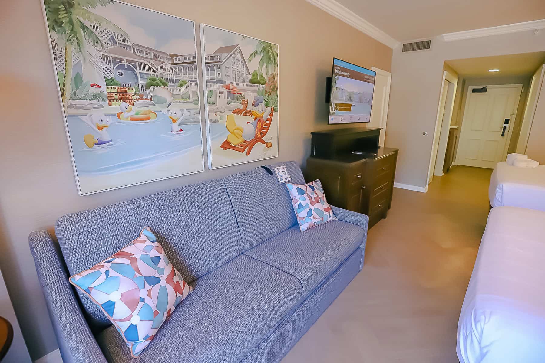 a room at a kid-friendly resort with Donald Duck artwork 