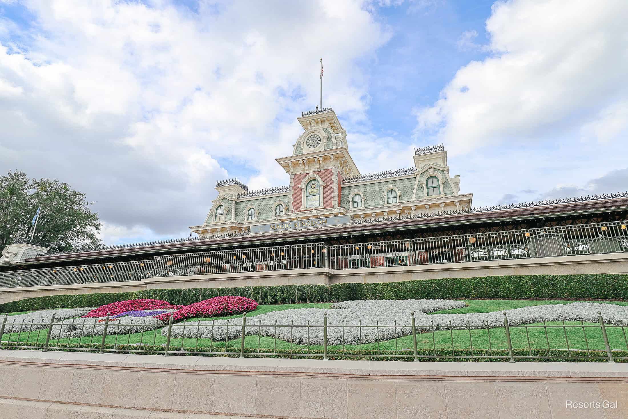 the entrance to Magic Kingdom Park with the Mickey floral topiary 