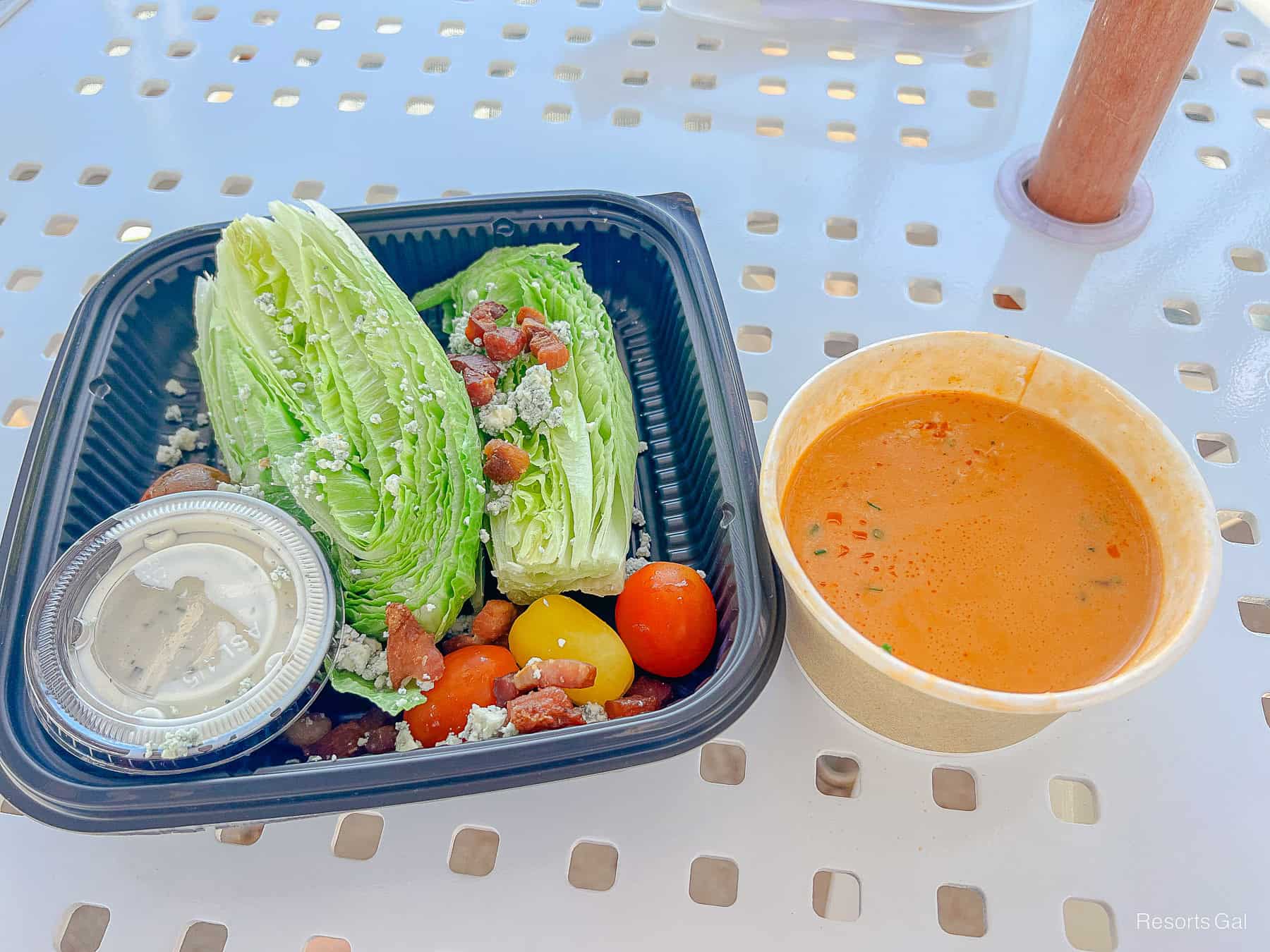 a soup and salad placed at a to go restaurant location at Disney World using mobile orders 