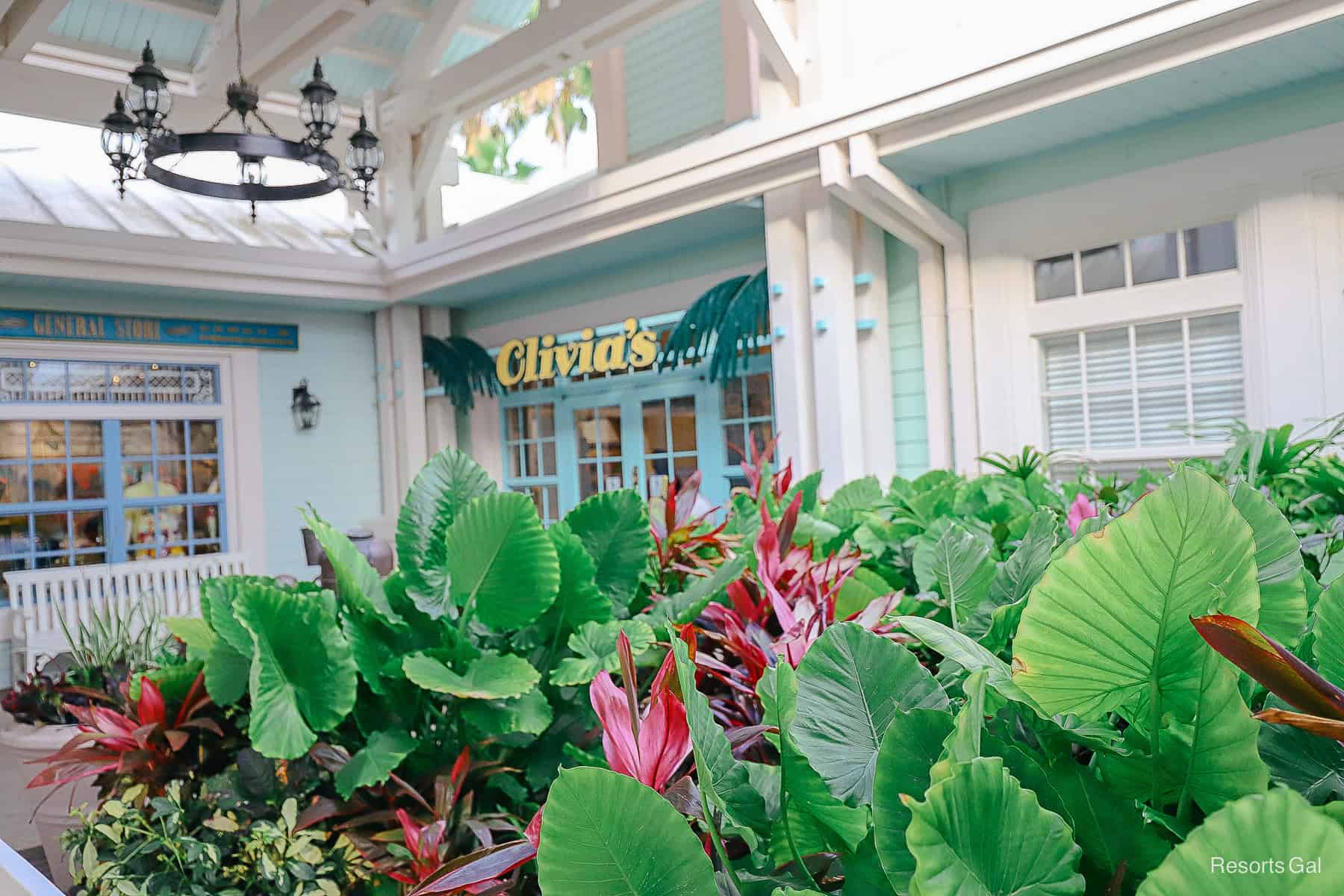 the sign and entrance with pretty landscaping at Olivia's at Old Key West 