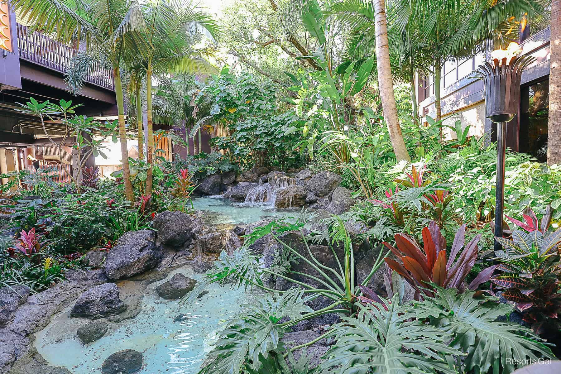 the entrance with waterfalls of Disney's Polynesian Village Resort 