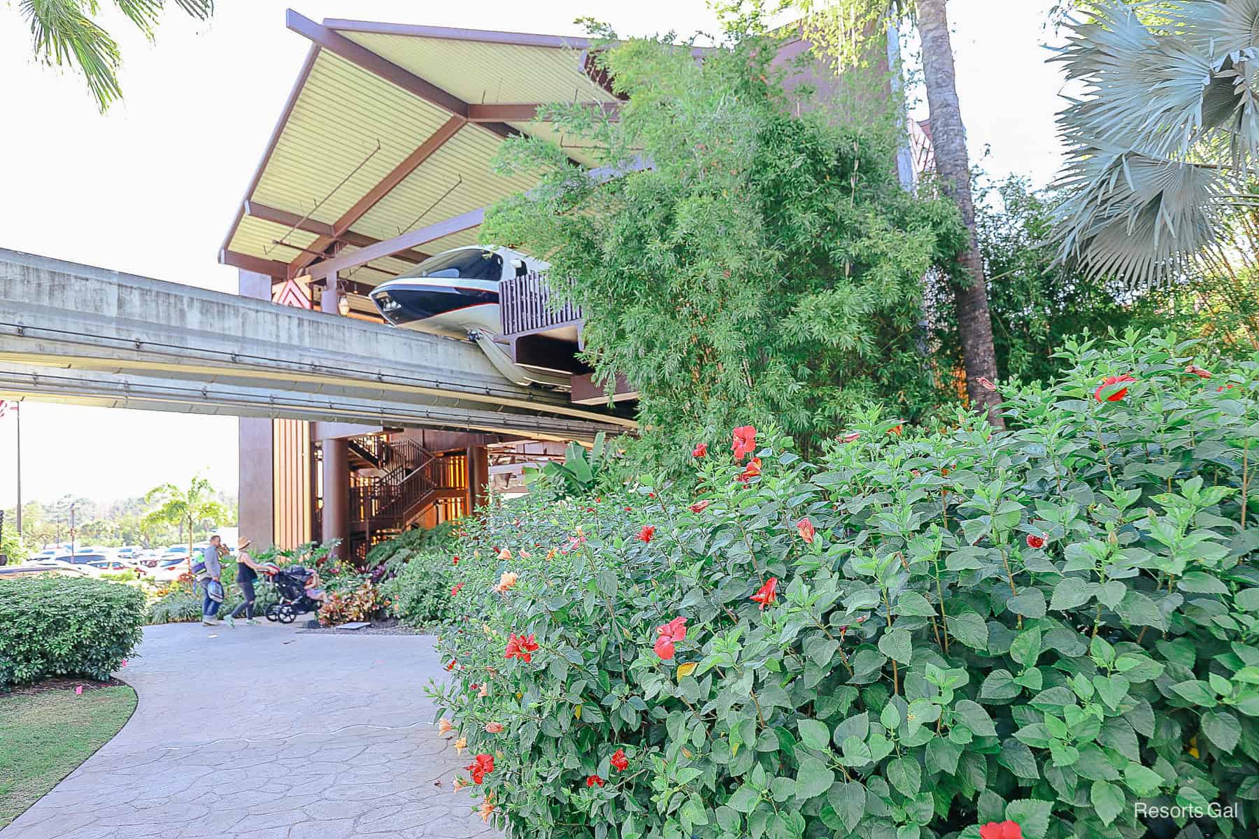 the nose of monorail black stopped at Disney's Polynesian's platform 