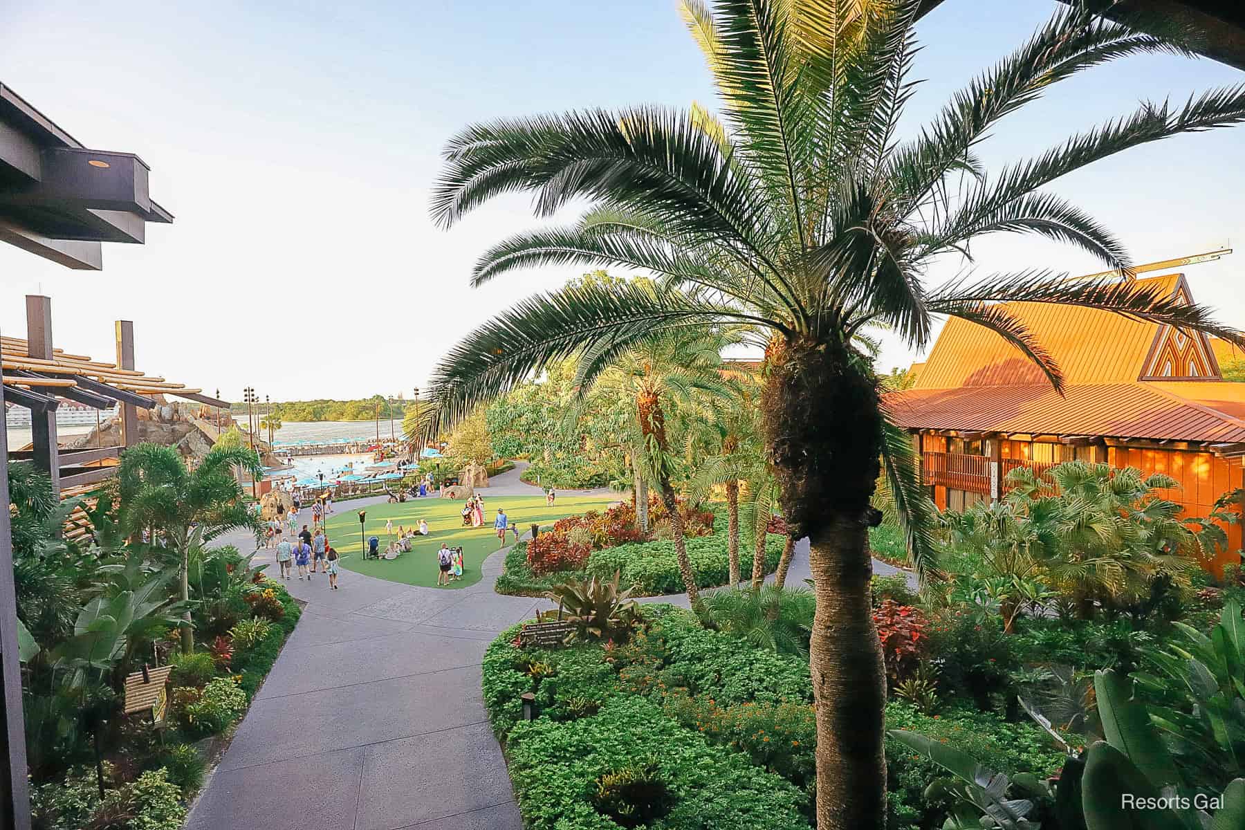 a view of the grounds of Disney's Polynesian Resort with a palm tree 