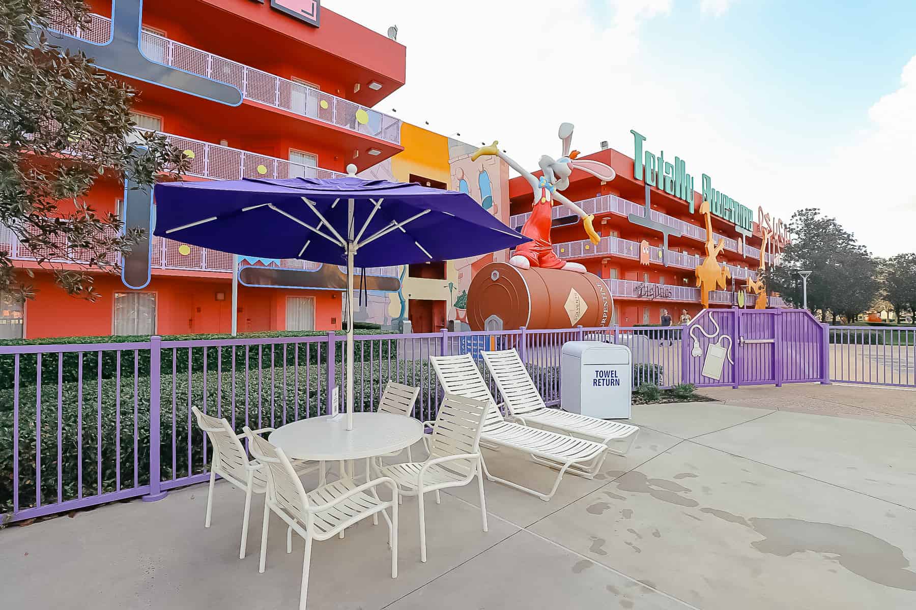 tables with umbrellas at the Computer Pool 