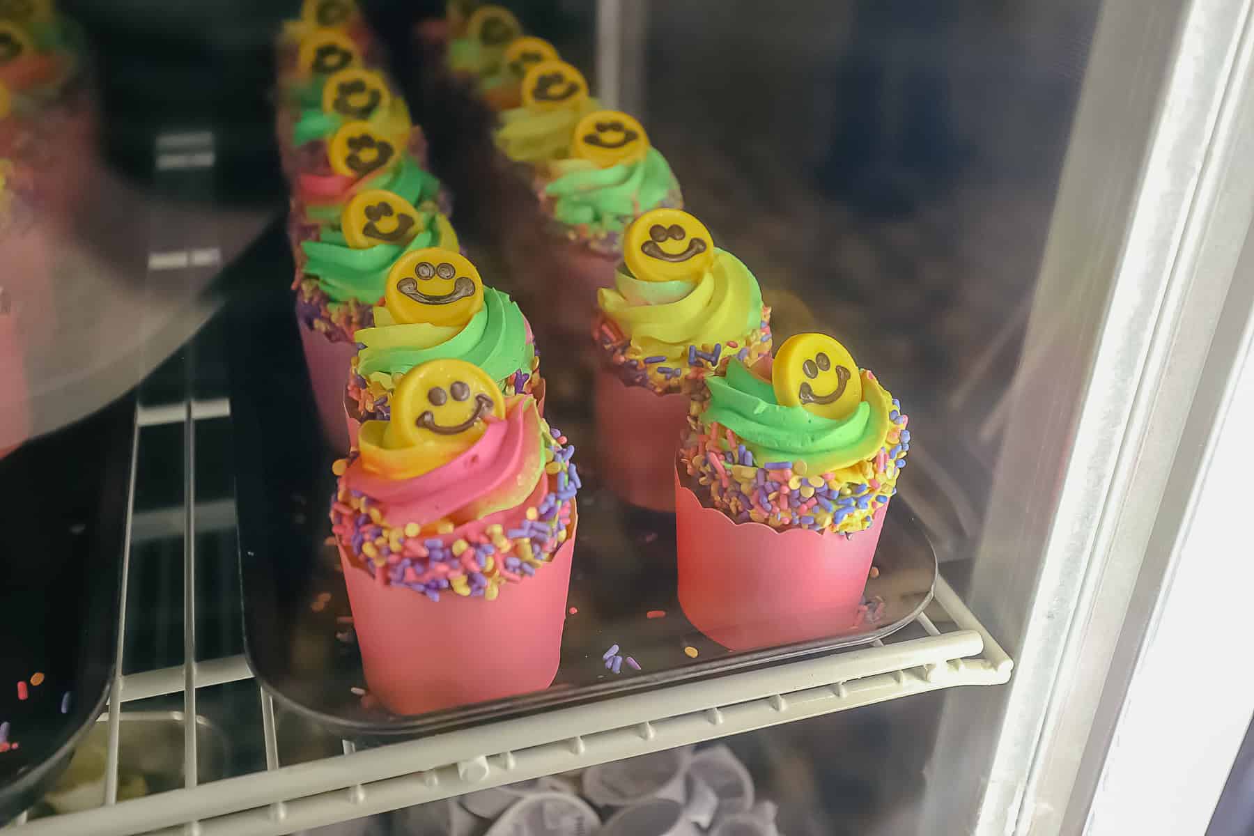 the popular tie dye cupcake that's a Pop Century signature dessert 