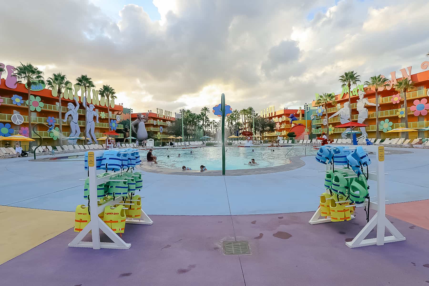 the Pop Century Pool in the 60s section of the resort at sunset 