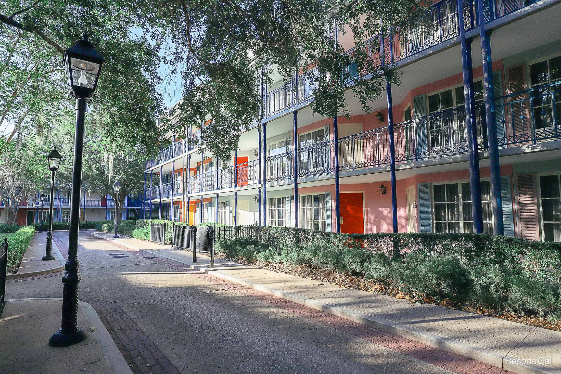 a sidewalk running through the Port Orleans Resort at Disney World 